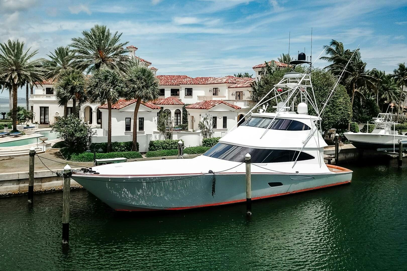 a boat docked at a pier aboard FRIGATE Yacht for Sale