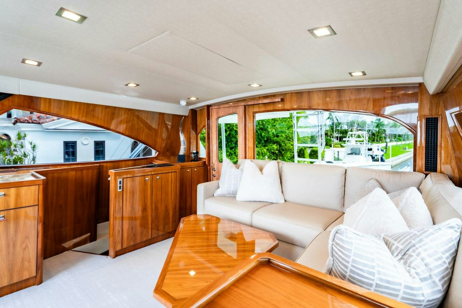 a living room with a large window aboard FRIGATE Yacht for Sale