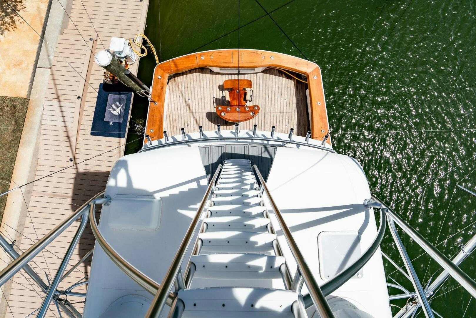 a spiral staircase leading up to a building aboard FRIGATE Yacht for Sale