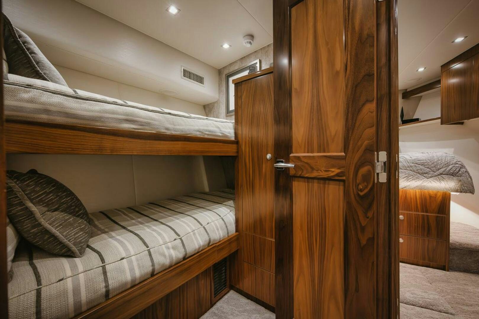 a bed in a room aboard WHIRLWIND Yacht for Sale