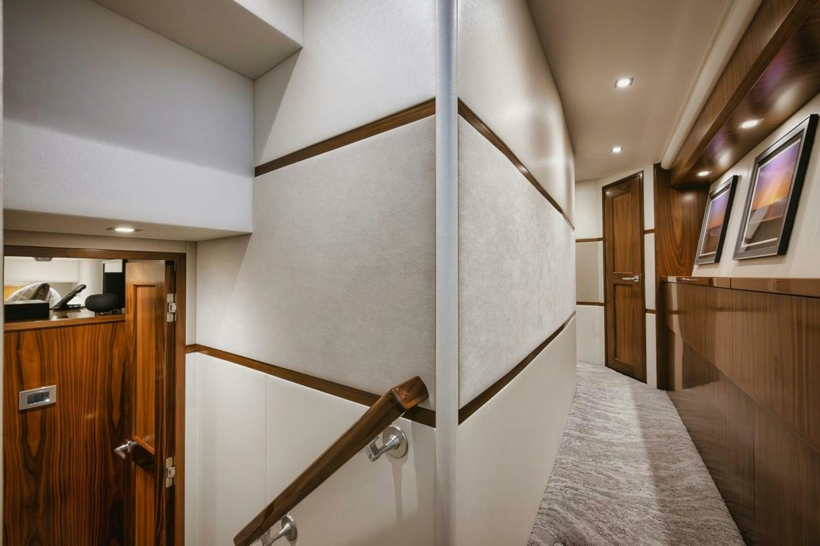 a hallway with wood cabinets aboard WHIRLWIND Yacht for Sale