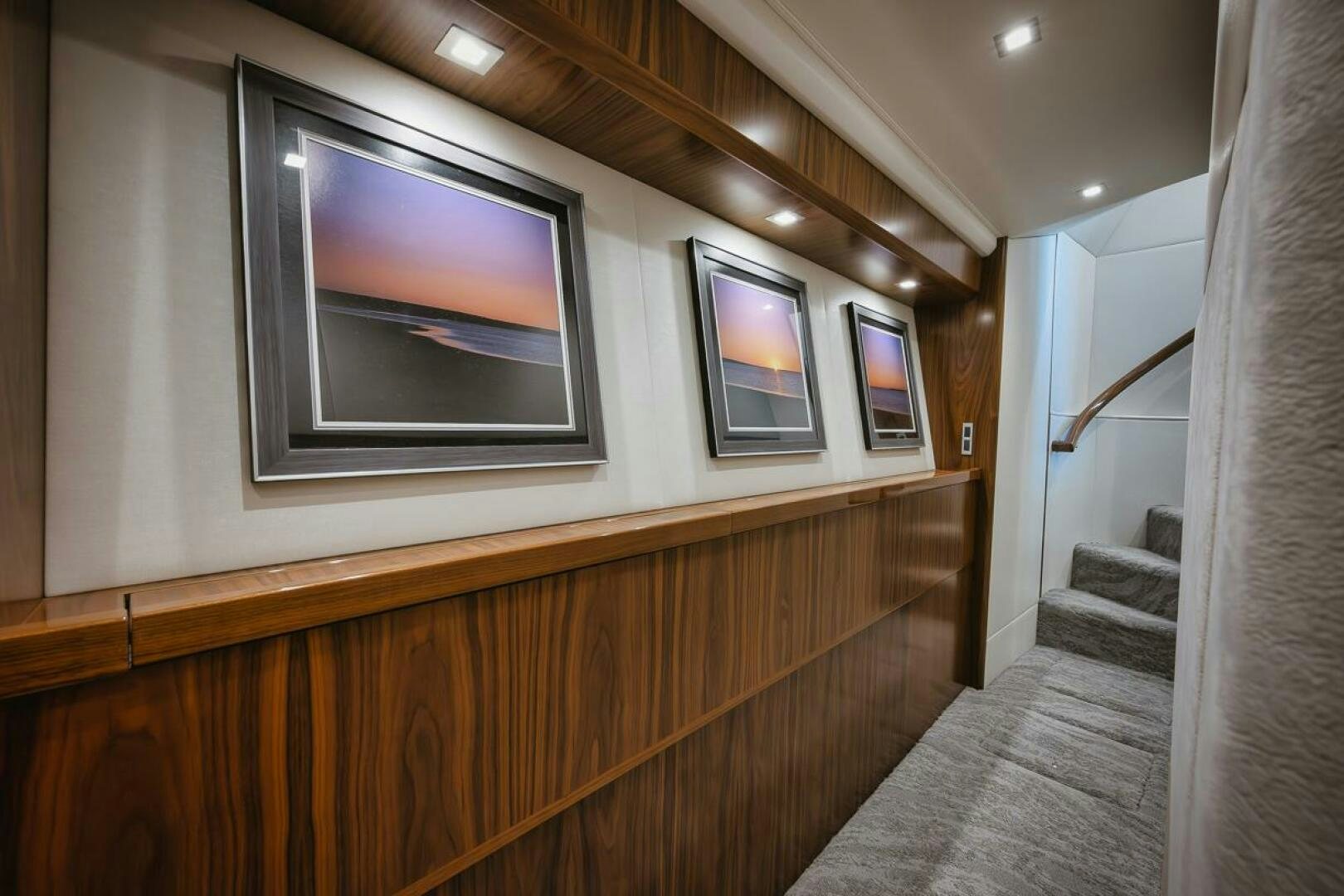 a room with a tv and a couch aboard WHIRLWIND Yacht for Sale