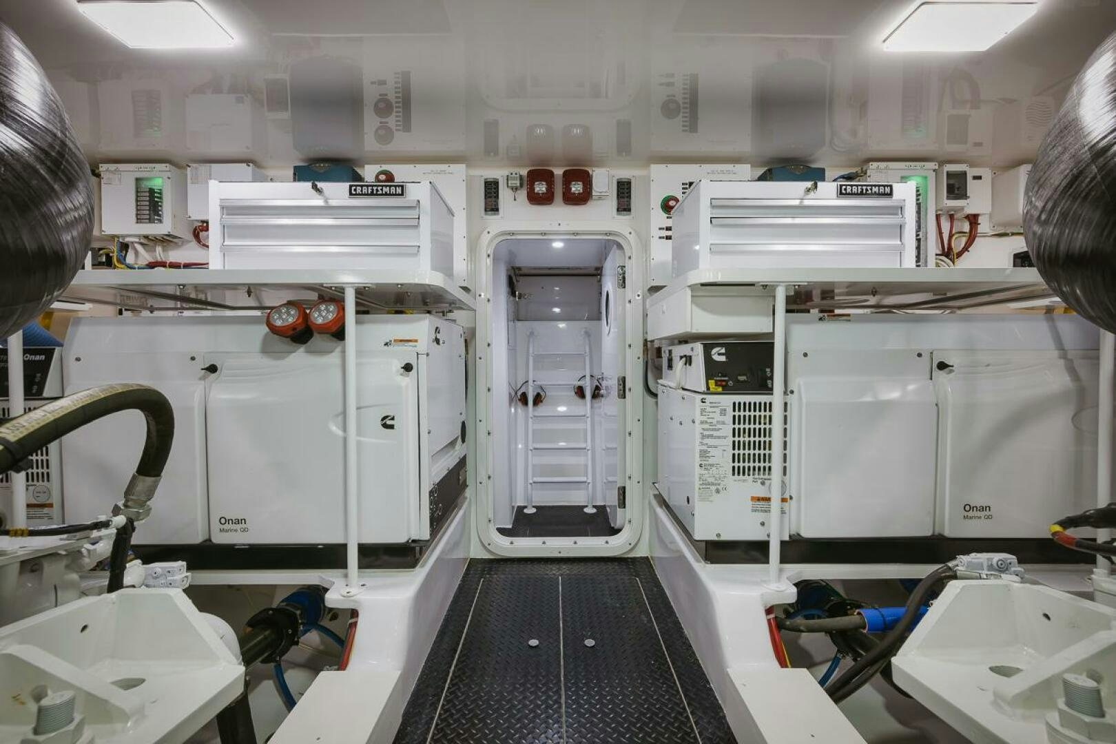 a room with white machines aboard WHIRLWIND Yacht for Sale