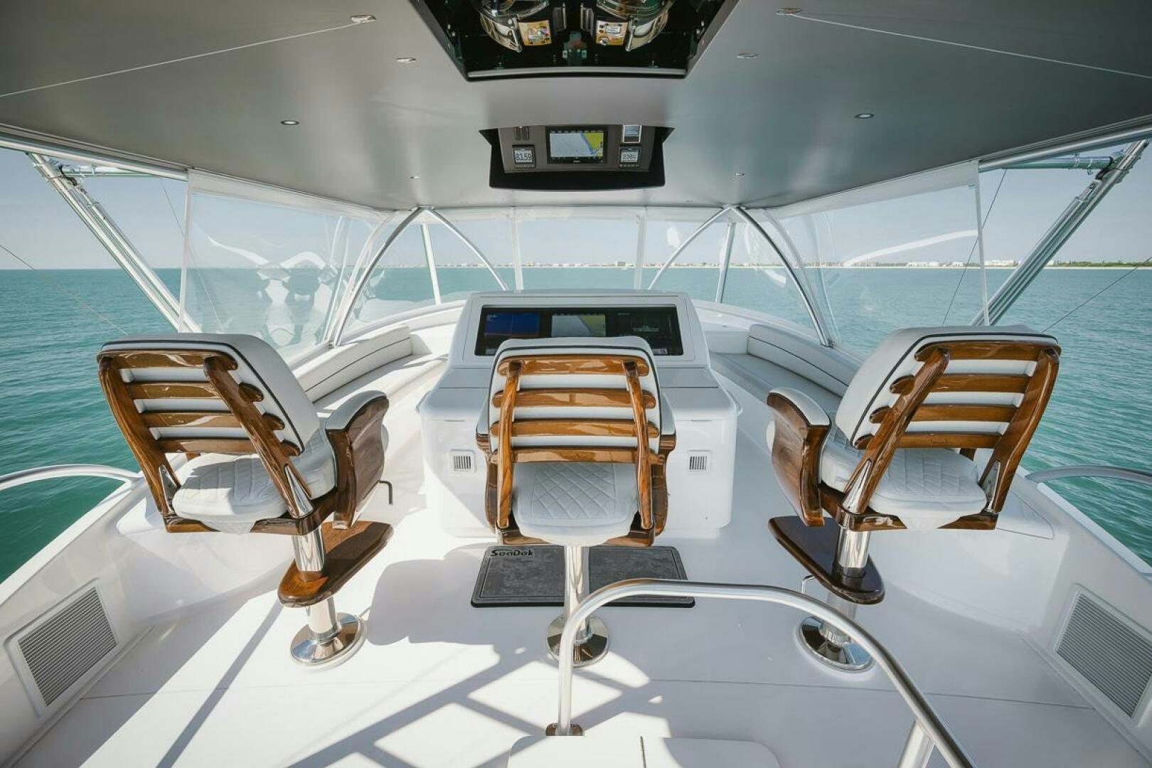 a group of chairs on a boat aboard WHIRLWIND Yacht for Sale