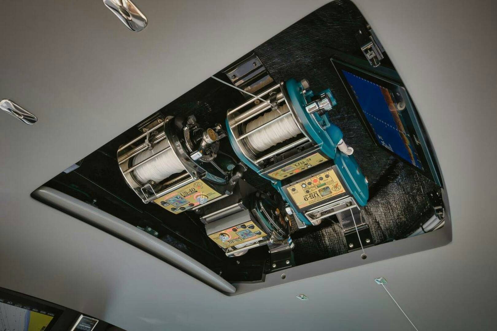 a computer tower with a blue screen aboard WHIRLWIND Yacht for Sale