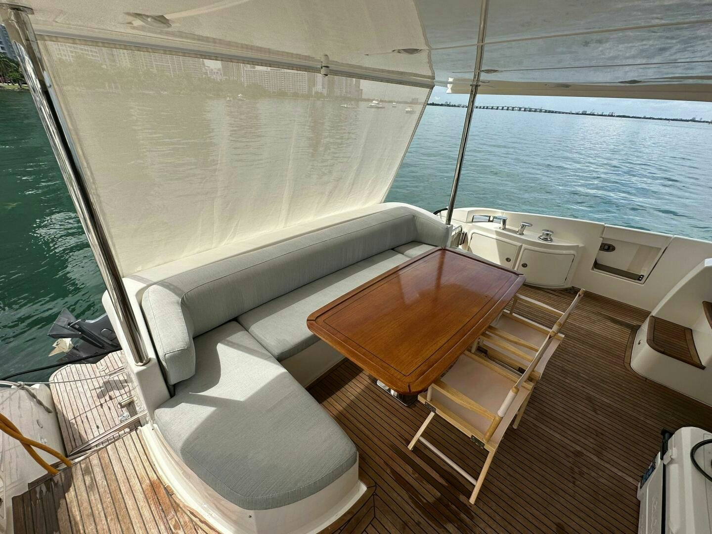 a boat with a large deck aboard SEVEN Yacht for Sale