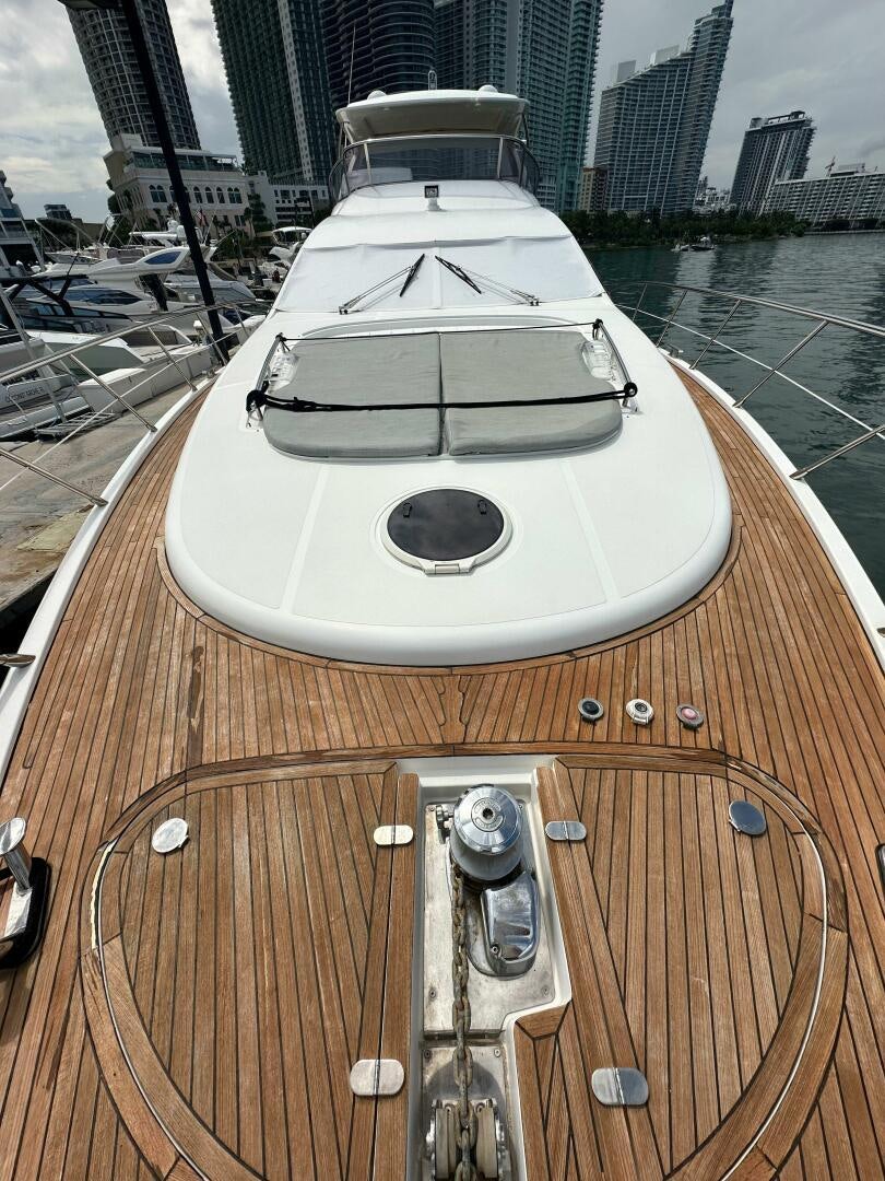 a boat on a deck aboard SEVEN Yacht for Sale