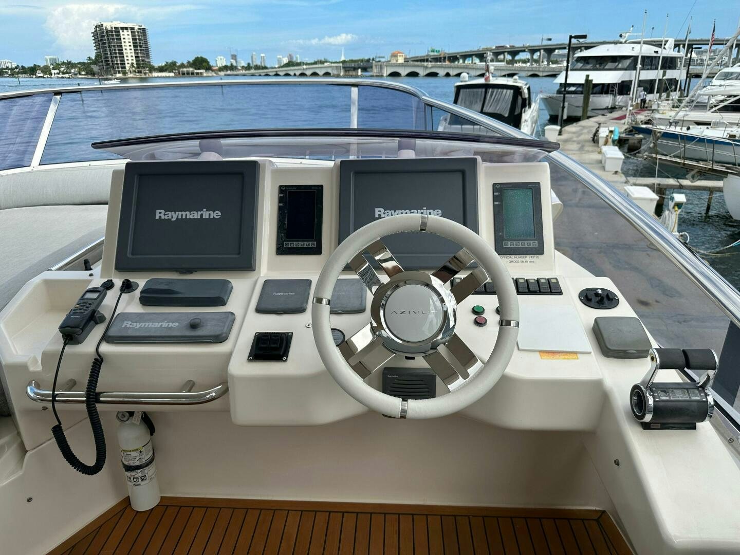a white vehicle on a deck aboard SEVEN Yacht for Sale