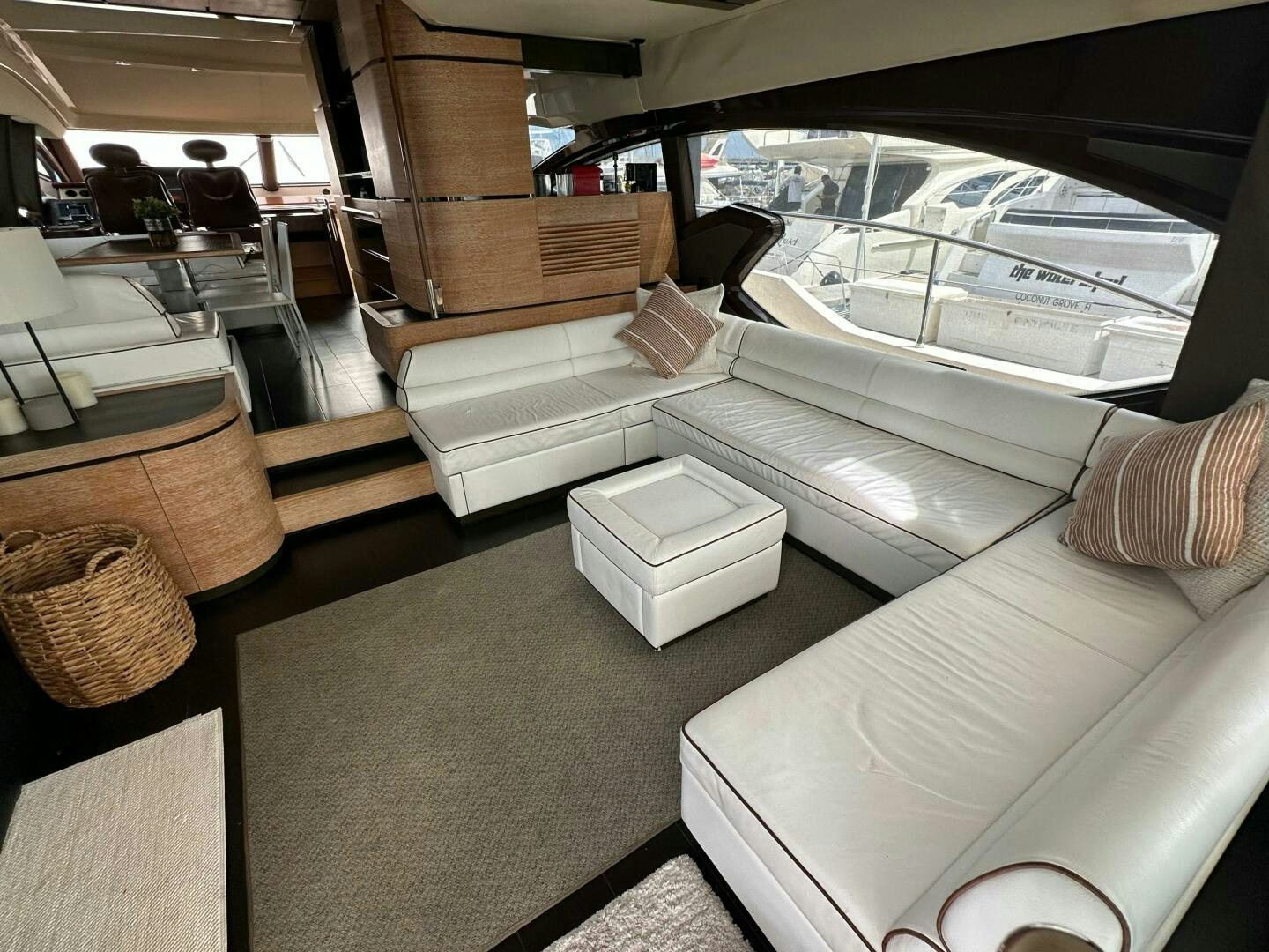 a car with a couch aboard SEVEN Yacht for Sale