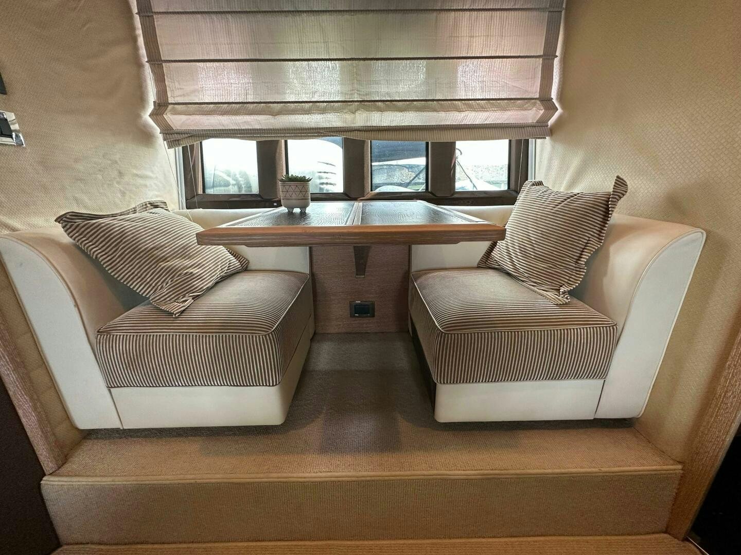 a room with two couches aboard SEVEN Yacht for Sale