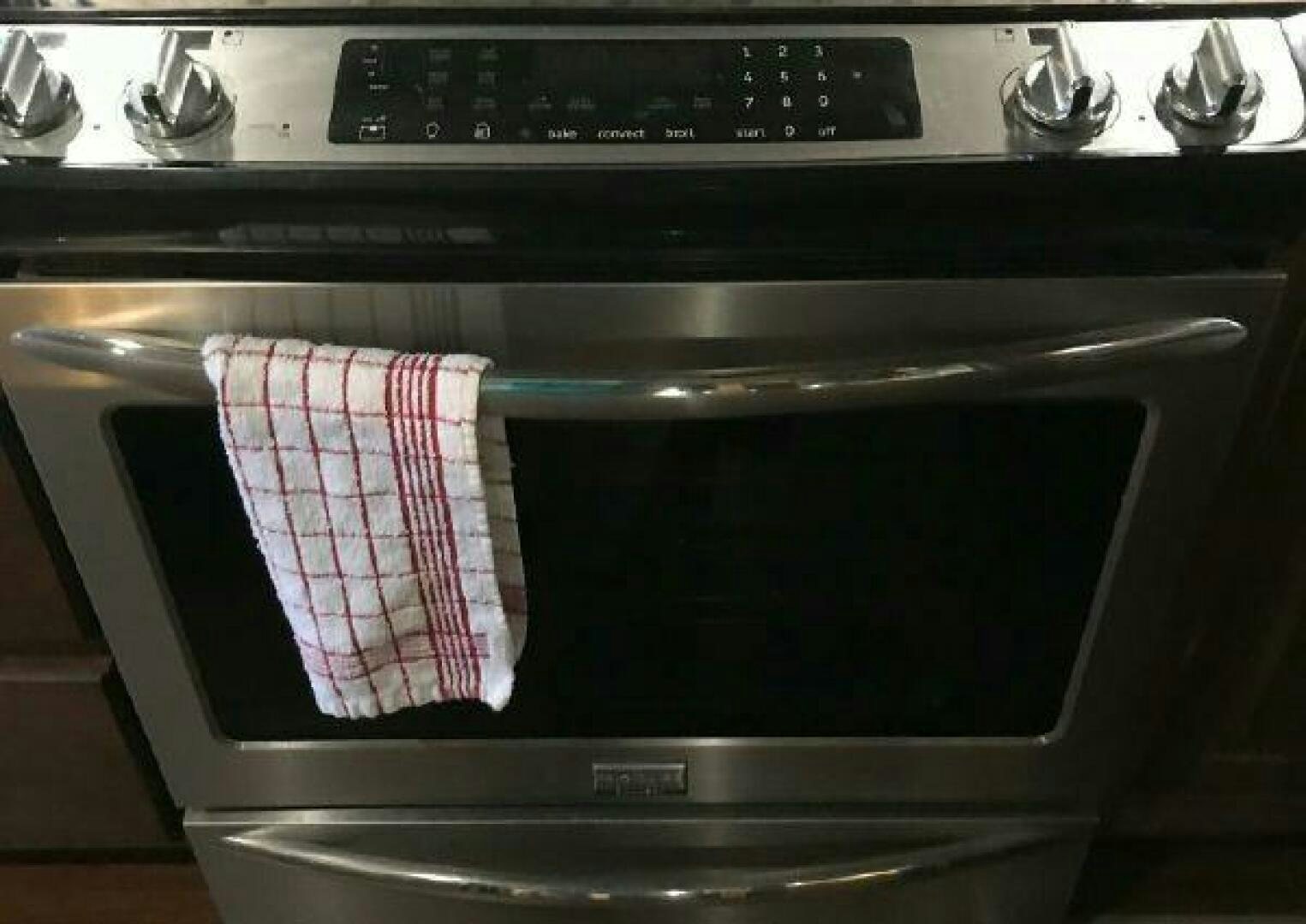 a stove with a flag on it aboard ST. SOMEWHERE Yacht for Sale