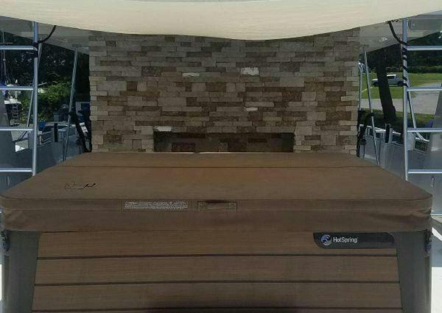 a wood table in a room aboard ST. SOMEWHERE Yacht for Sale