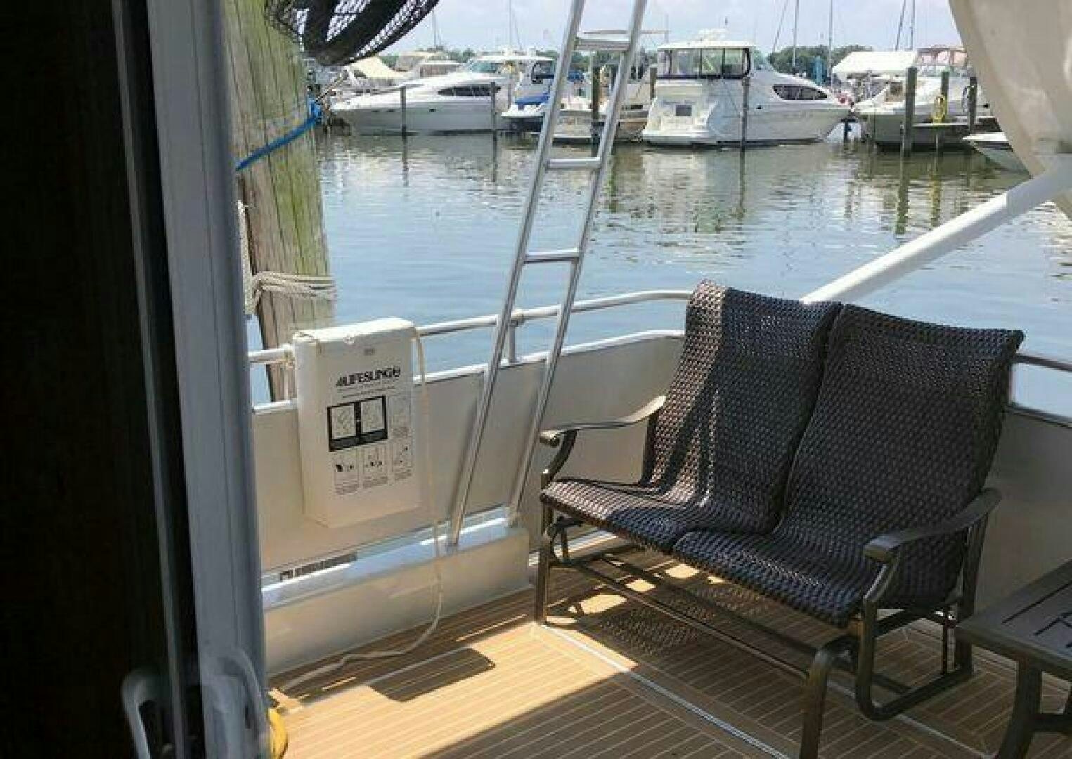 chairs on a deck aboard ST. SOMEWHERE Yacht for Sale