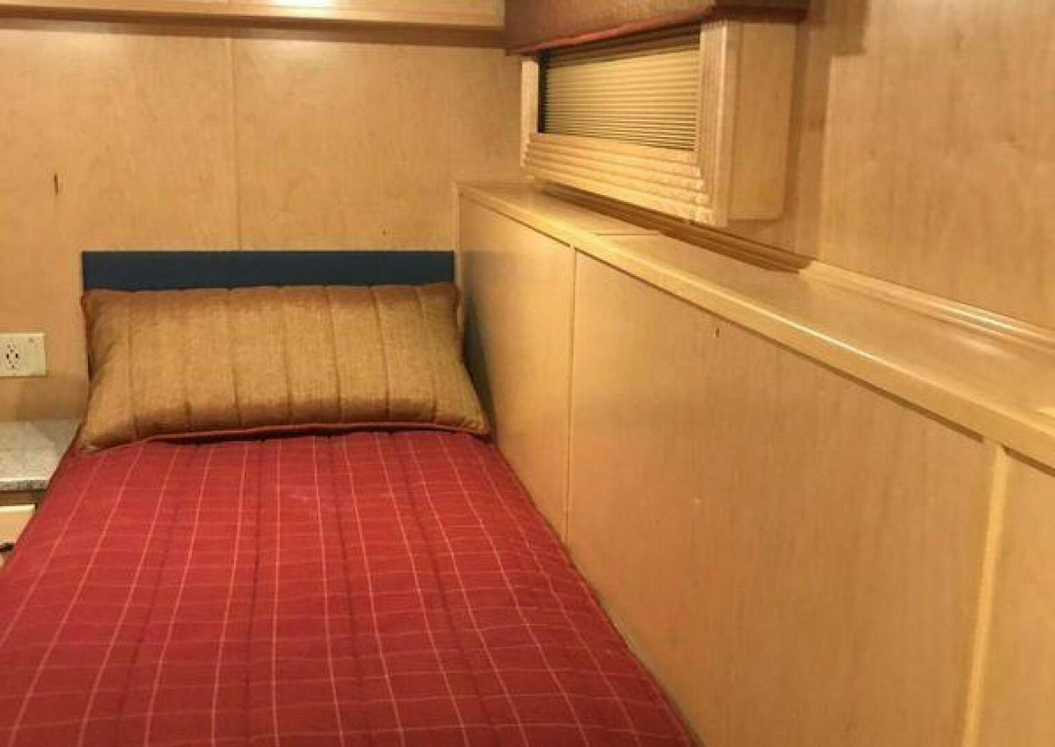 a bed in a room aboard ST. SOMEWHERE Yacht for Sale