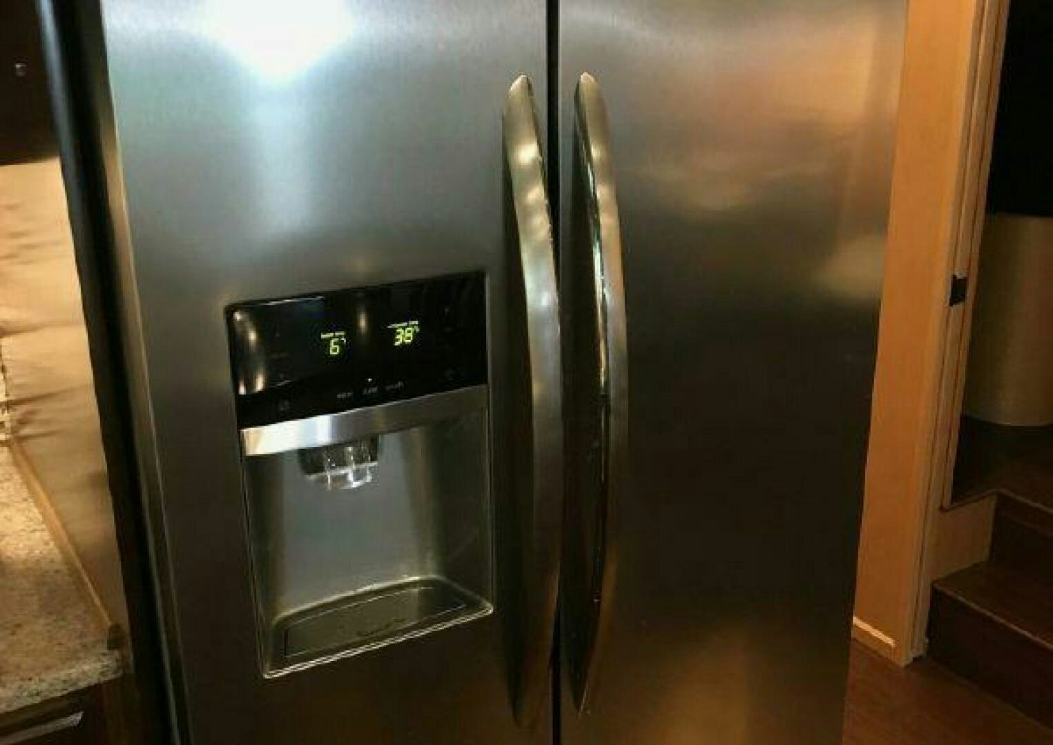 a large silver refrigerator aboard ST. SOMEWHERE Yacht for Sale