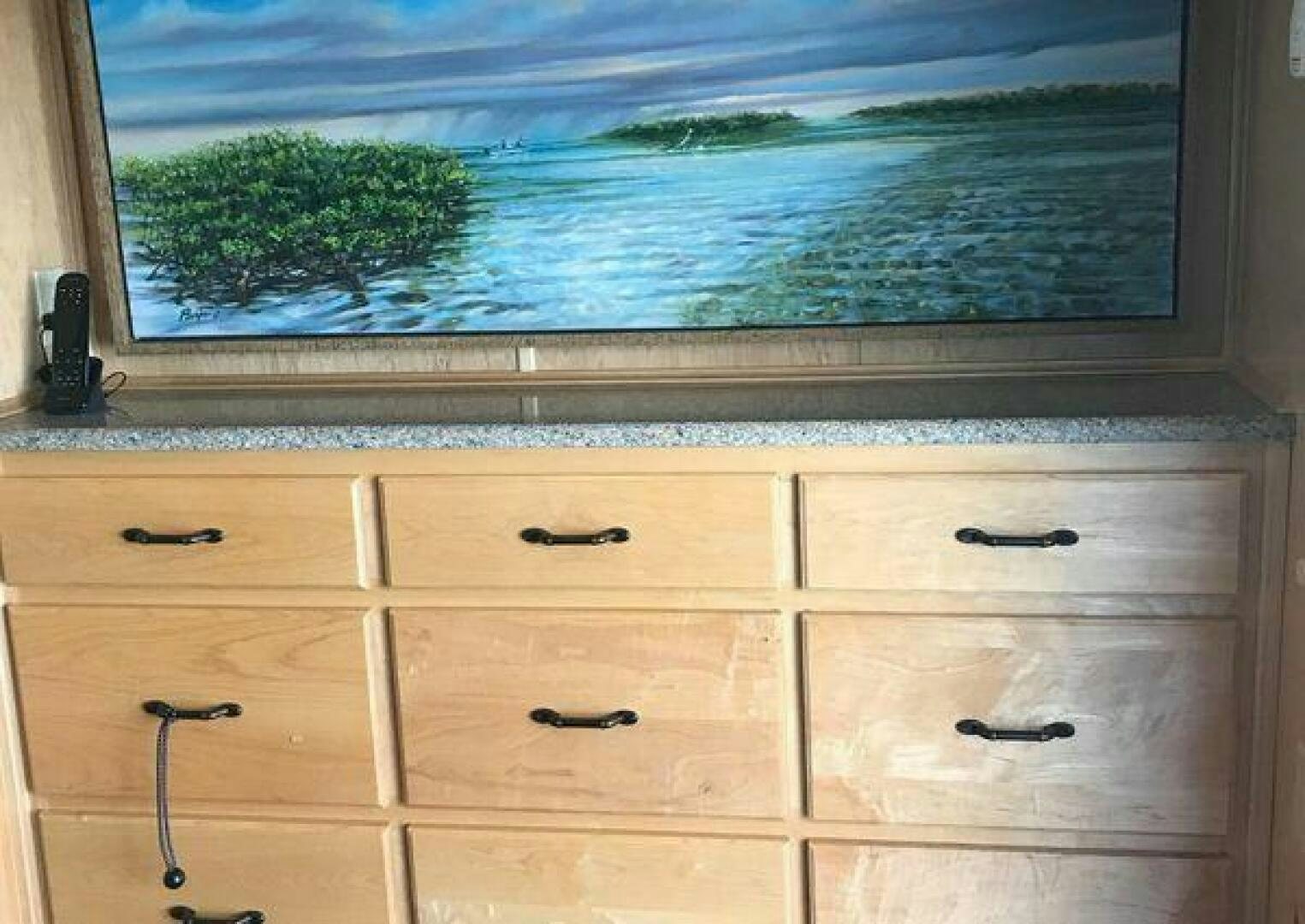 a dresser with a window aboard ST. SOMEWHERE Yacht for Sale