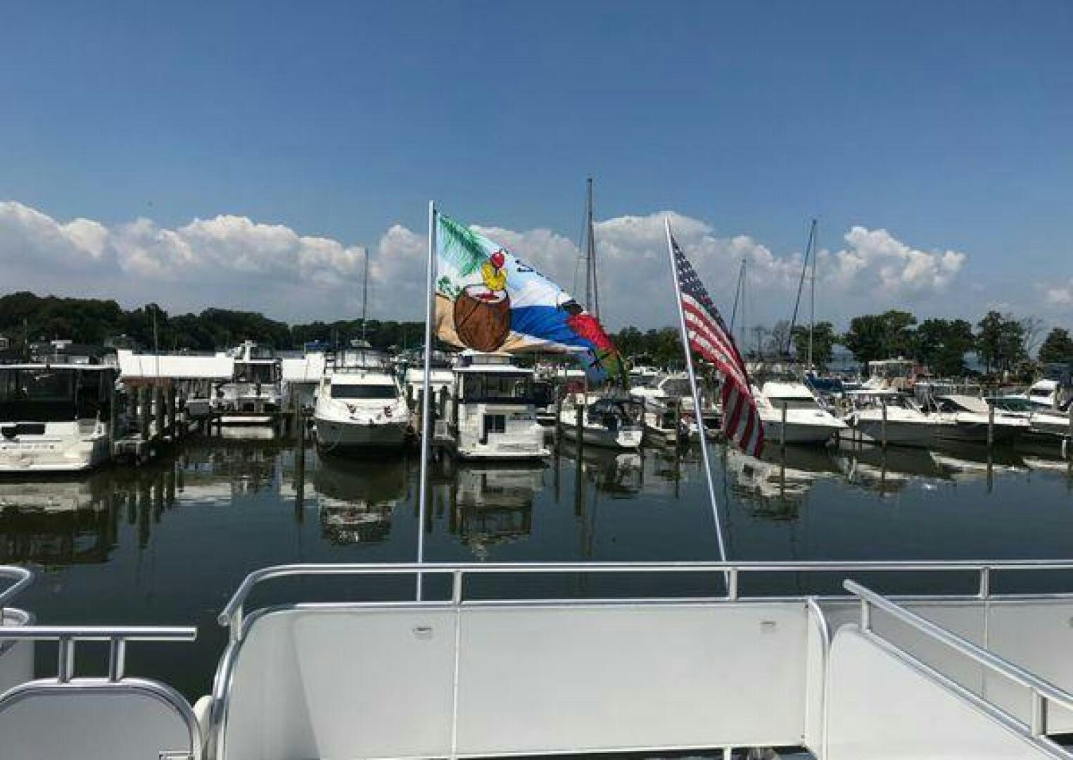 a group of boats on a body of water aboard ST. SOMEWHERE Yacht for Sale