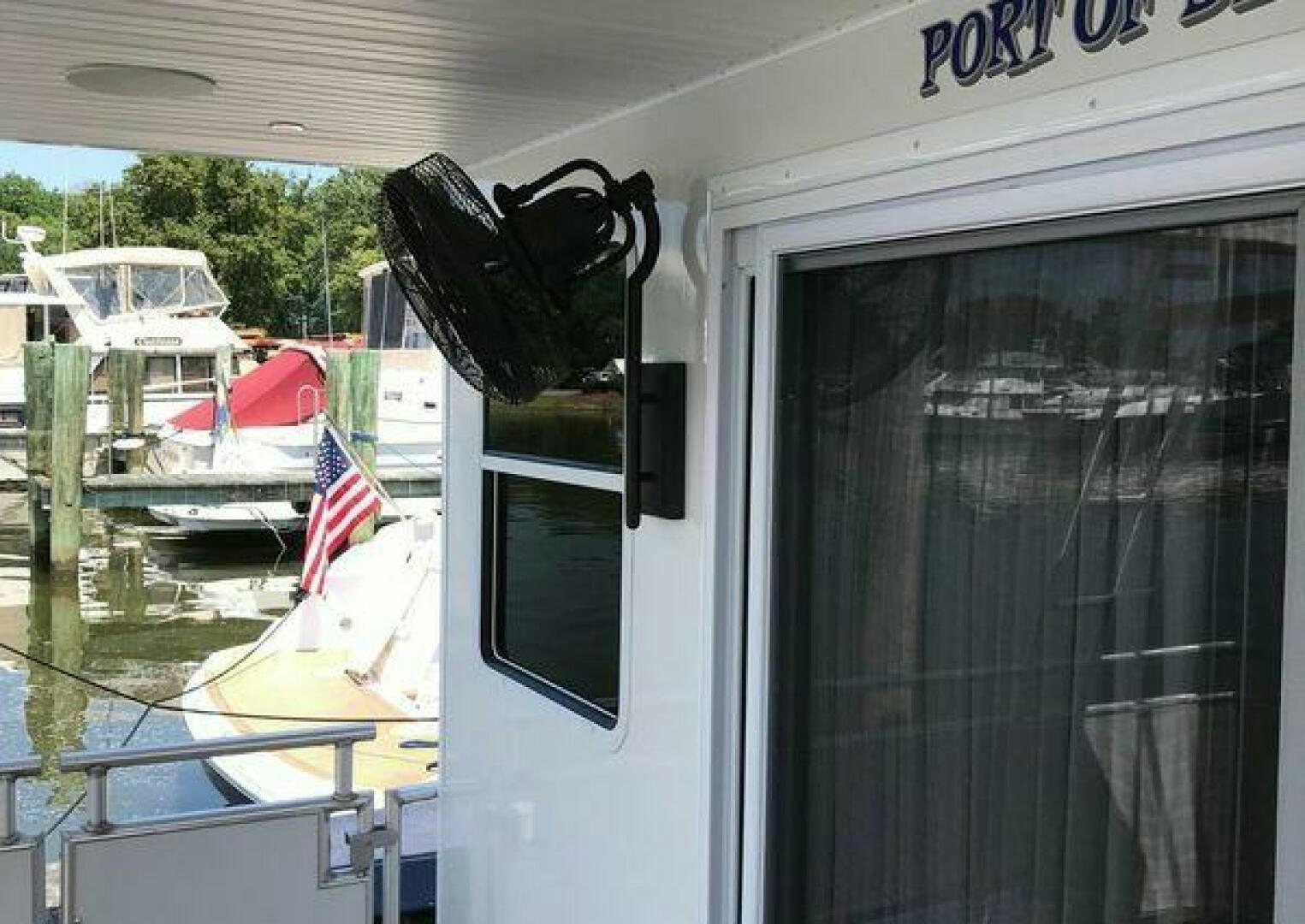 a flag on a pole aboard ST. SOMEWHERE Yacht for Sale