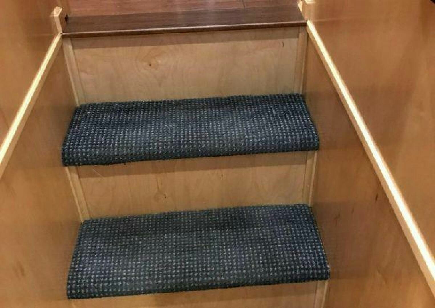 a rug on a wood floor aboard ST. SOMEWHERE Yacht for Sale