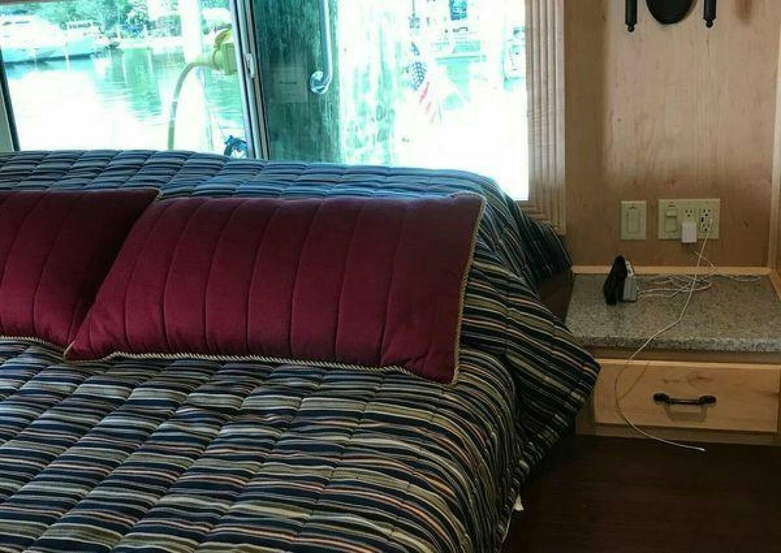 a couch in a room aboard ST. SOMEWHERE Yacht for Sale