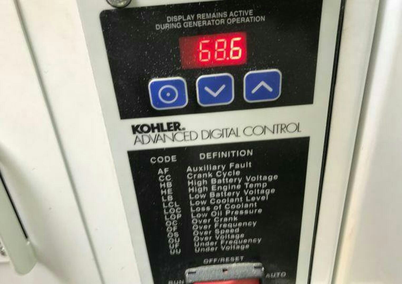 a black rectangular object with a red and blue label aboard ST. SOMEWHERE Yacht for Sale