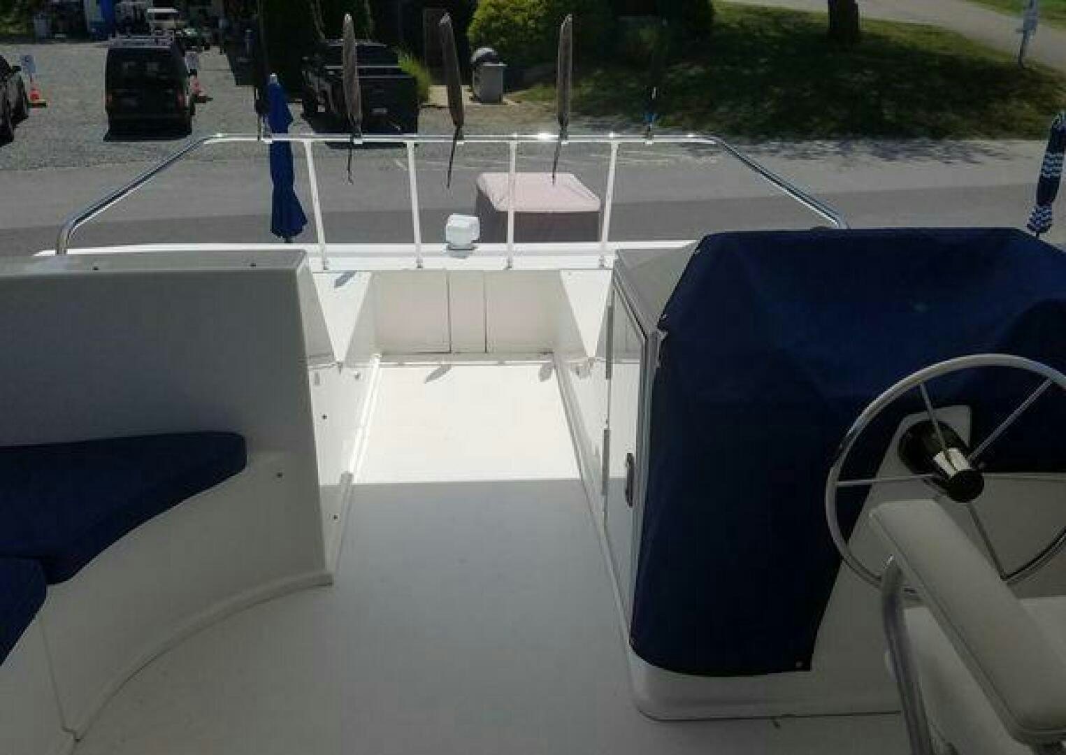 a white table with chairs on it aboard ST. SOMEWHERE Yacht for Sale