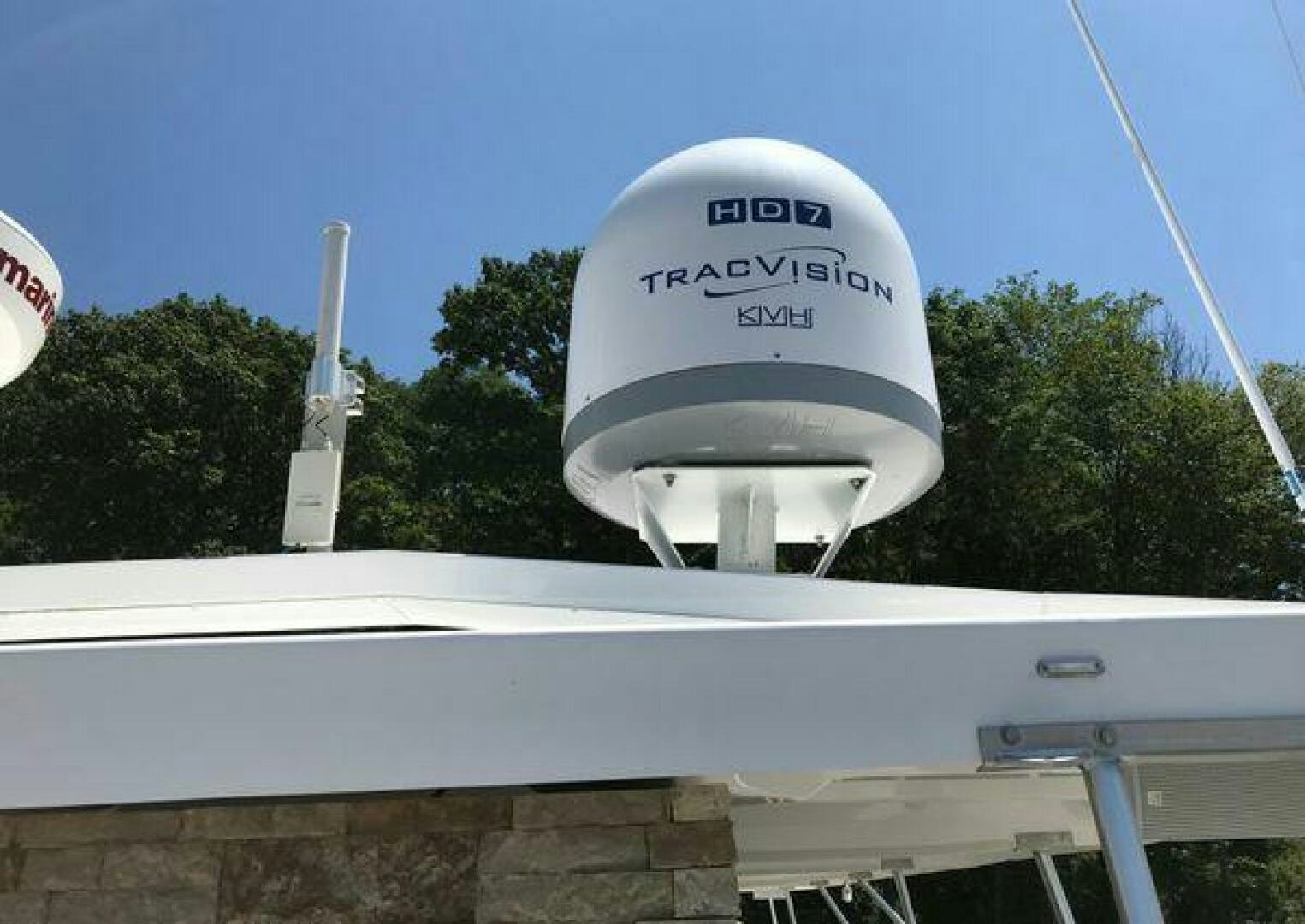 a large white satellite dish aboard ST. SOMEWHERE Yacht for Sale