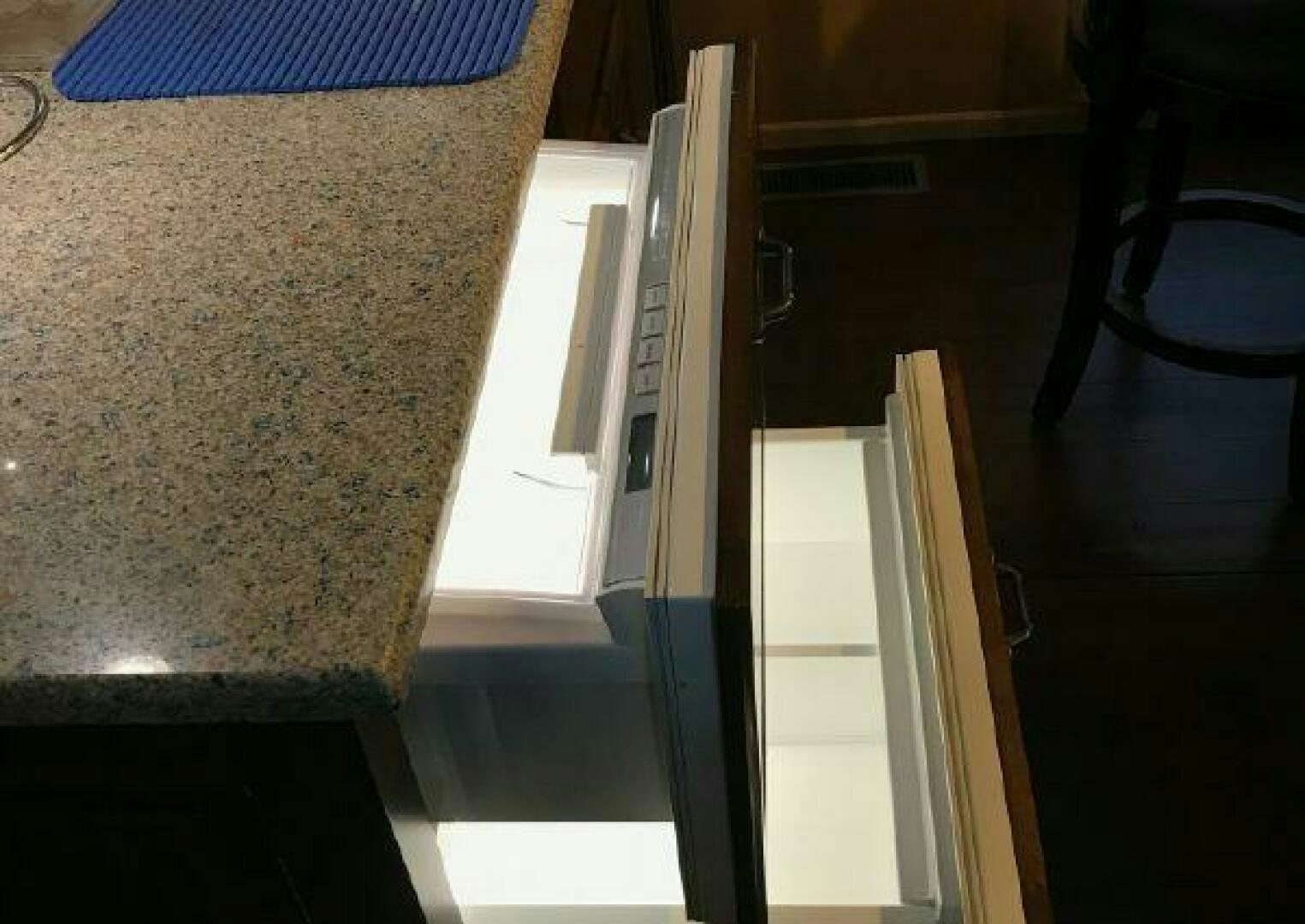 a white machine with a handle aboard ST. SOMEWHERE Yacht for Sale