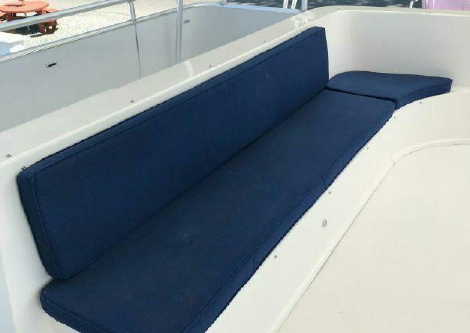 a blue rectangular object on a white surface aboard ST. SOMEWHERE Yacht for Sale