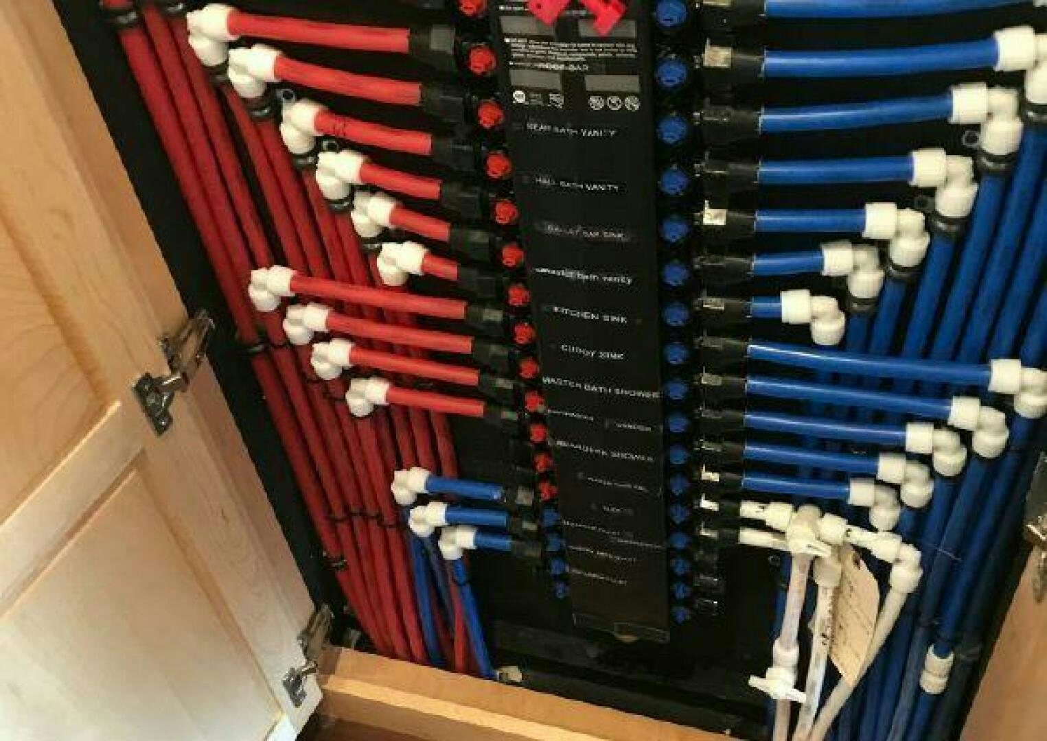 a group of people wearing white and red hats and standing in a room with blue walls aboard ST. SOMEWHERE Yacht for Sale