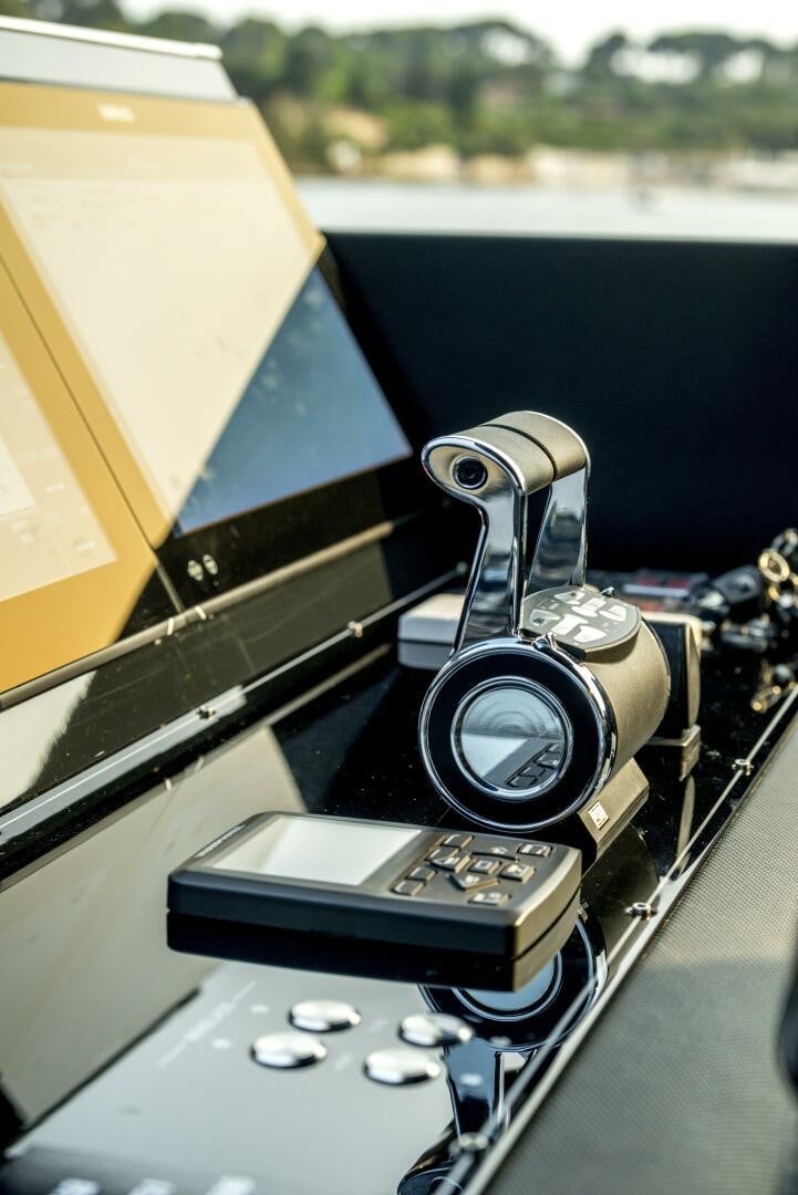 a close-up of a car stereo aboard GECUA Yacht for Sale