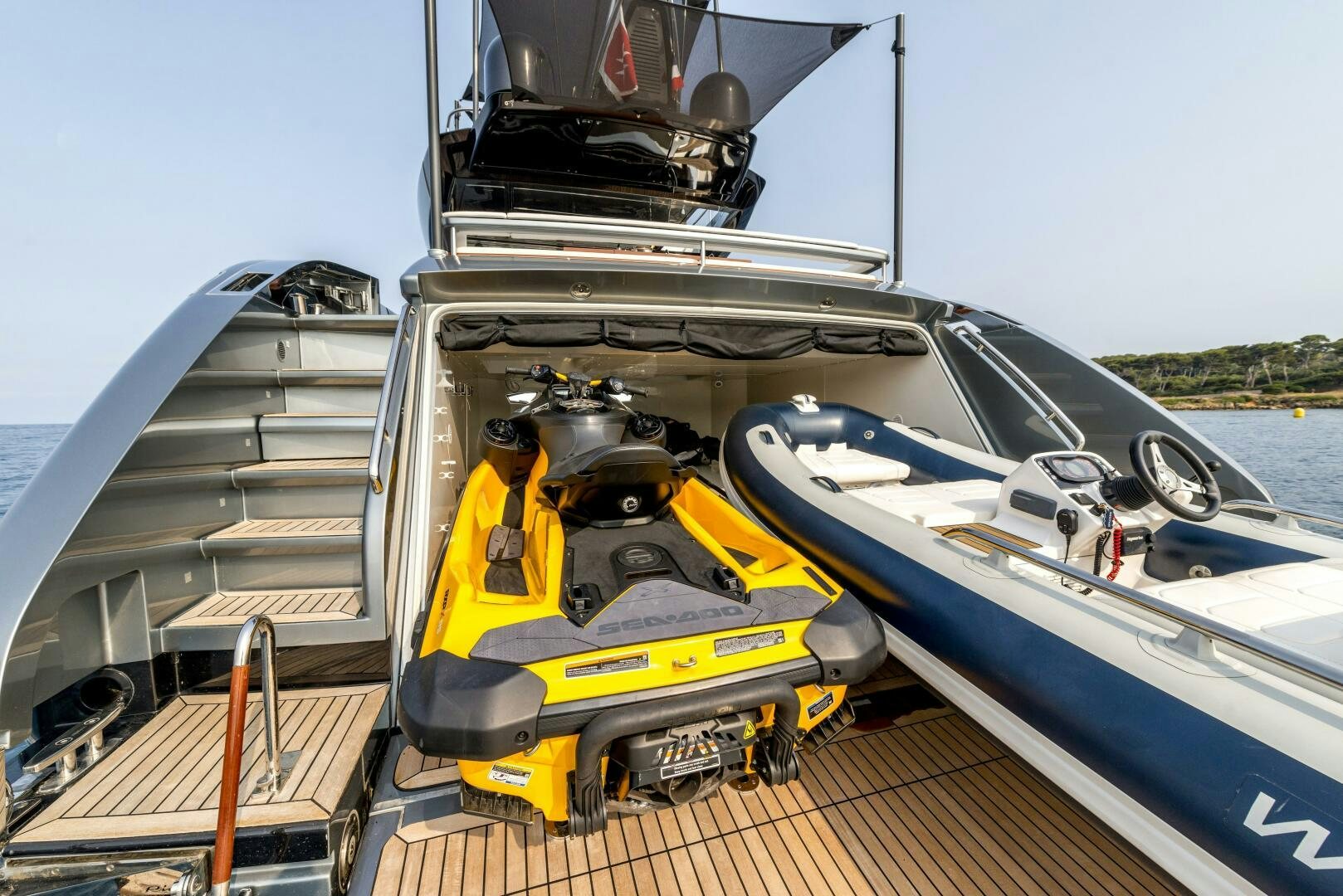 a yellow and black boat on a boat aboard GECUA Yacht for Sale