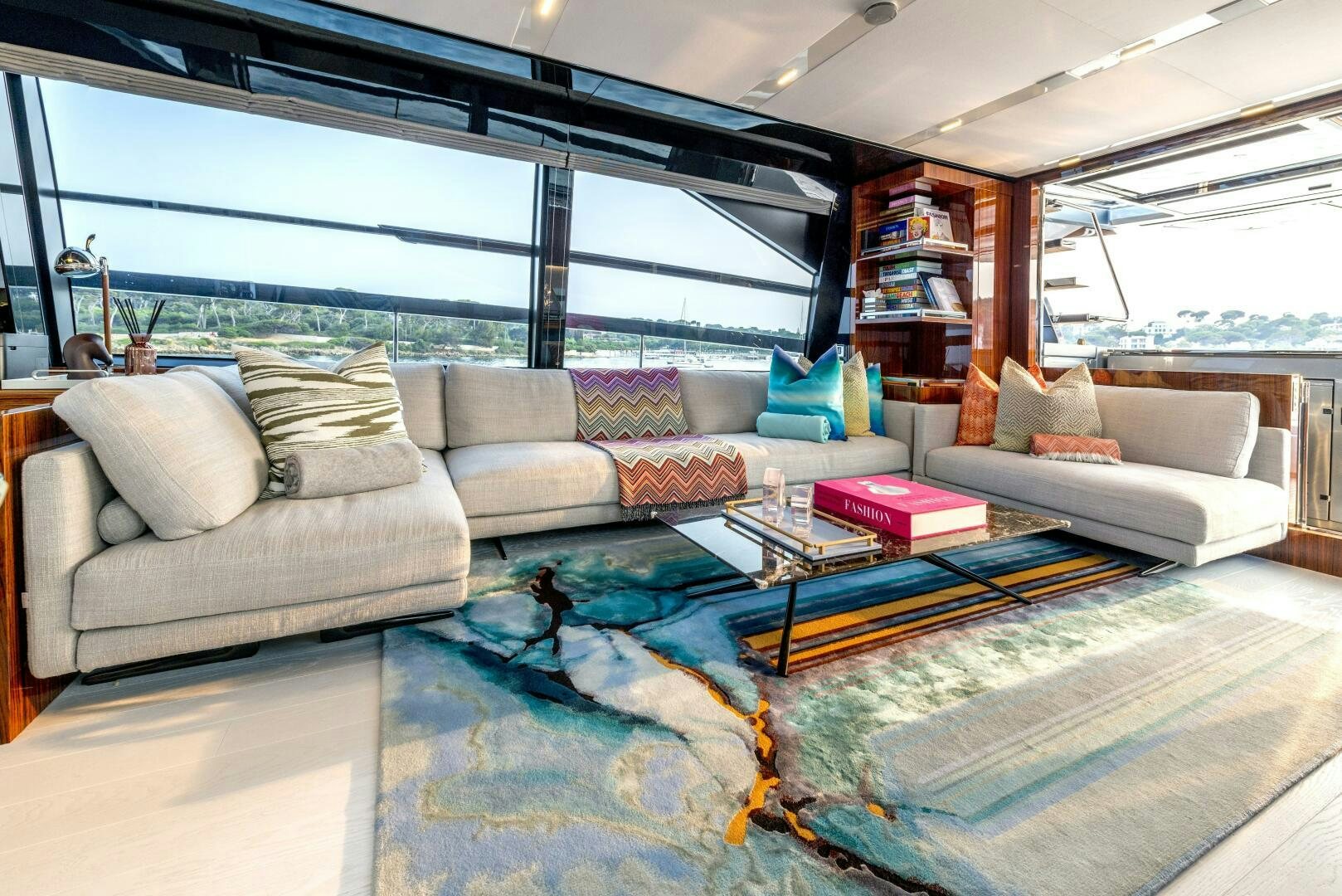 a living room with a large window aboard GECUA Yacht for Sale
