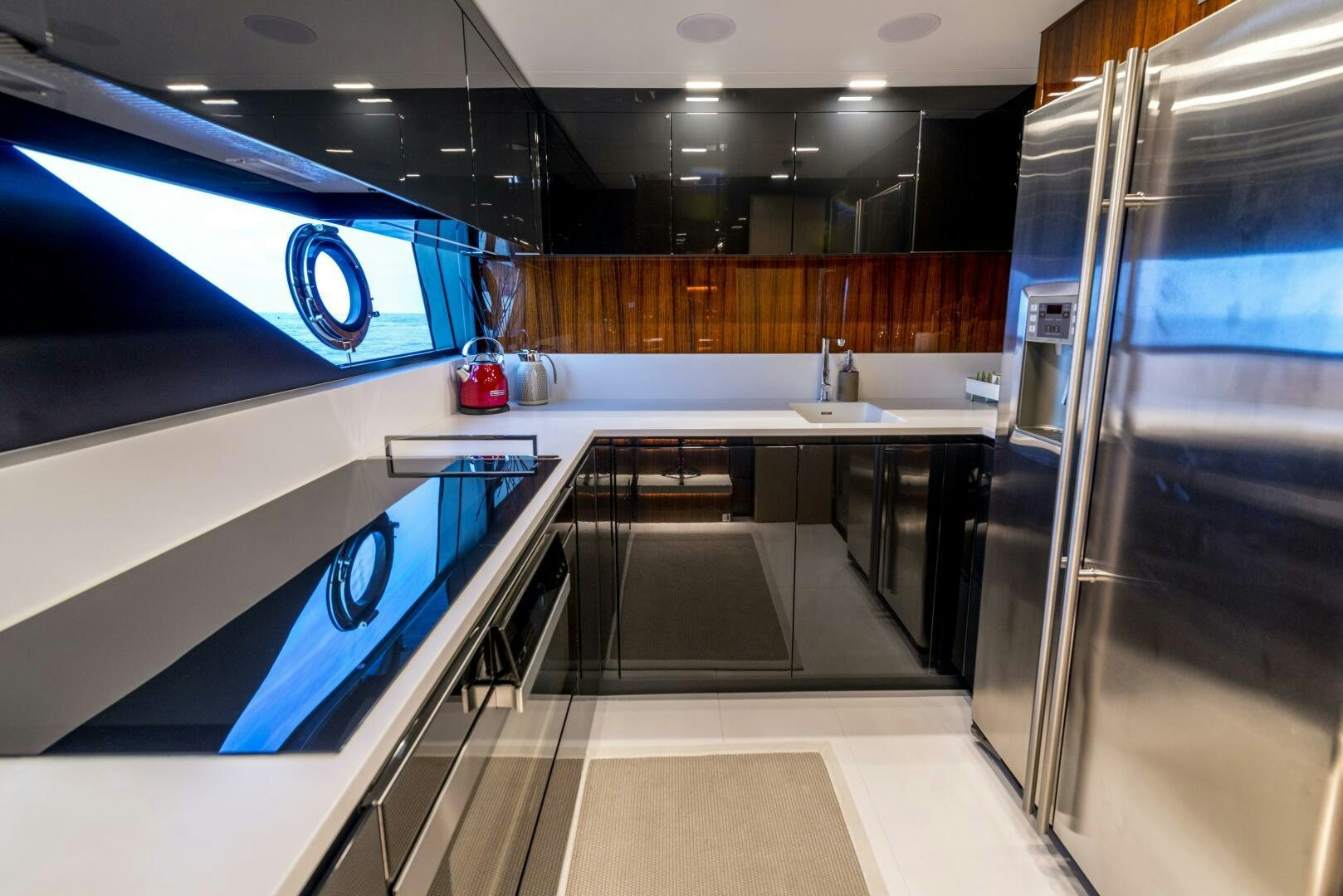 a kitchen with a large sink aboard GECUA Yacht for Sale
