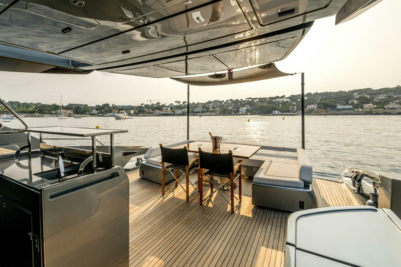 a boat with tables and chairs aboard GECUA Yacht for Sale