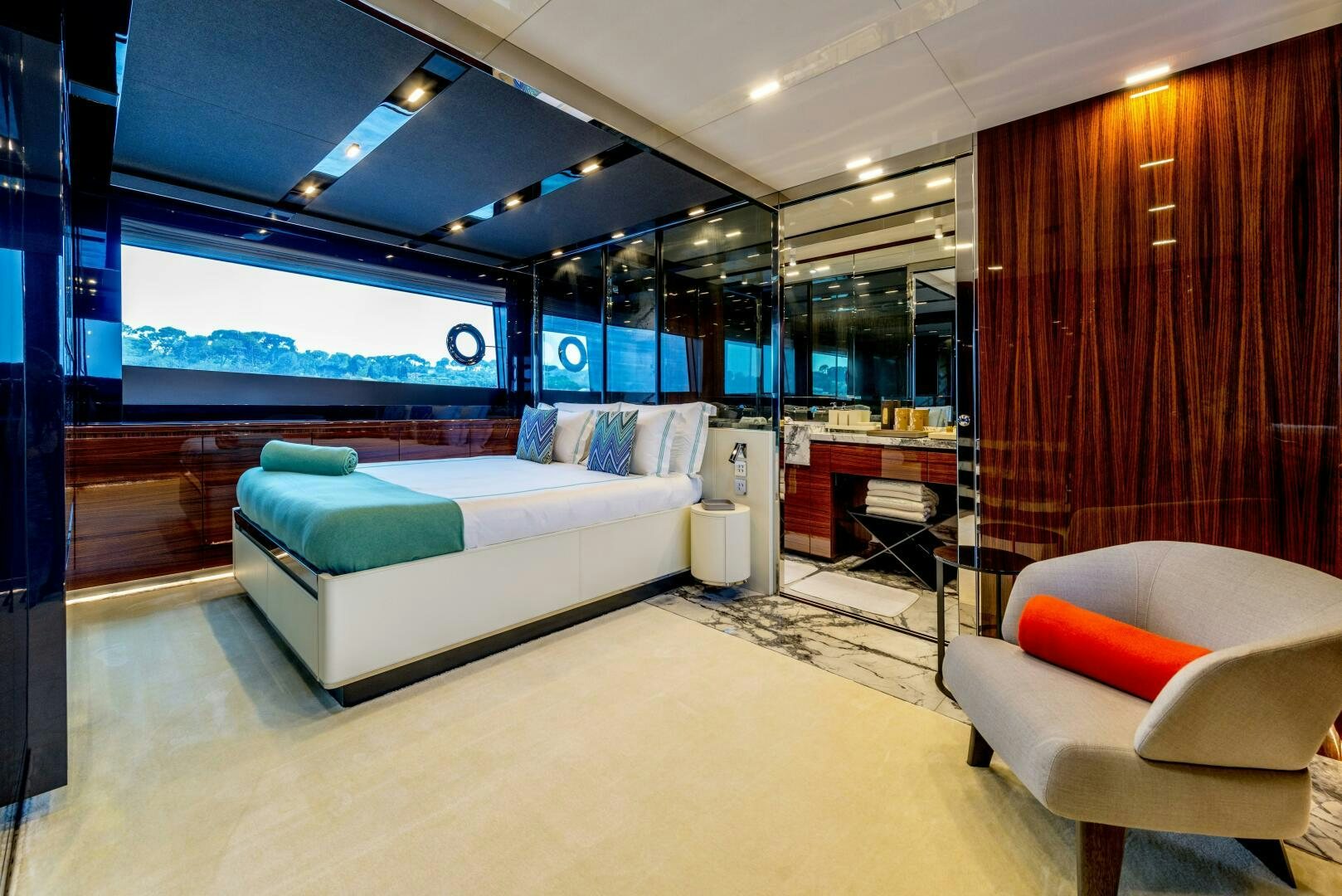 a room with a bed and a couch aboard GECUA Yacht for Sale
