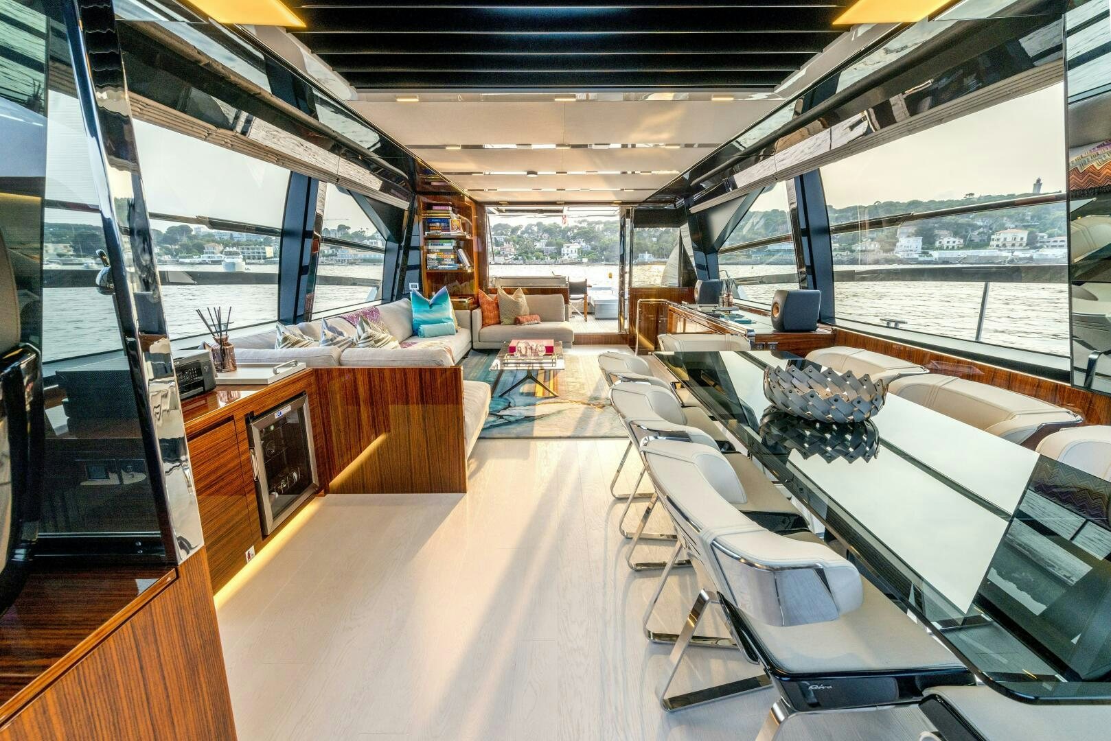 inside of a building with a large window and a view of the city aboard GECUA Yacht for Sale