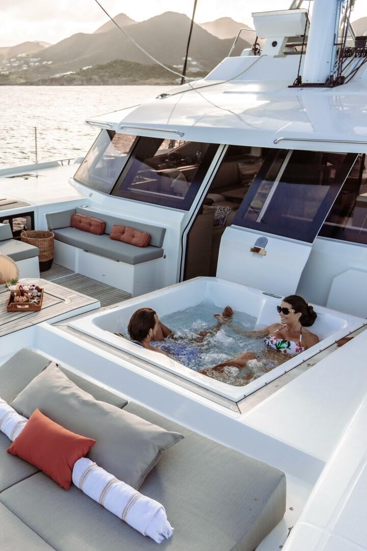 a boat with a large bed aboard OCEANUS Yacht for Sale