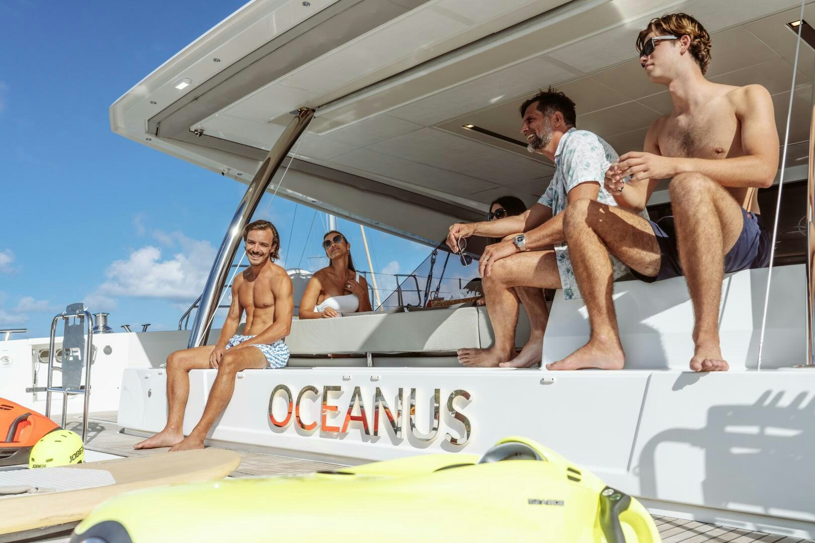 a group of men on a boat aboard OCEANUS Yacht for Sale