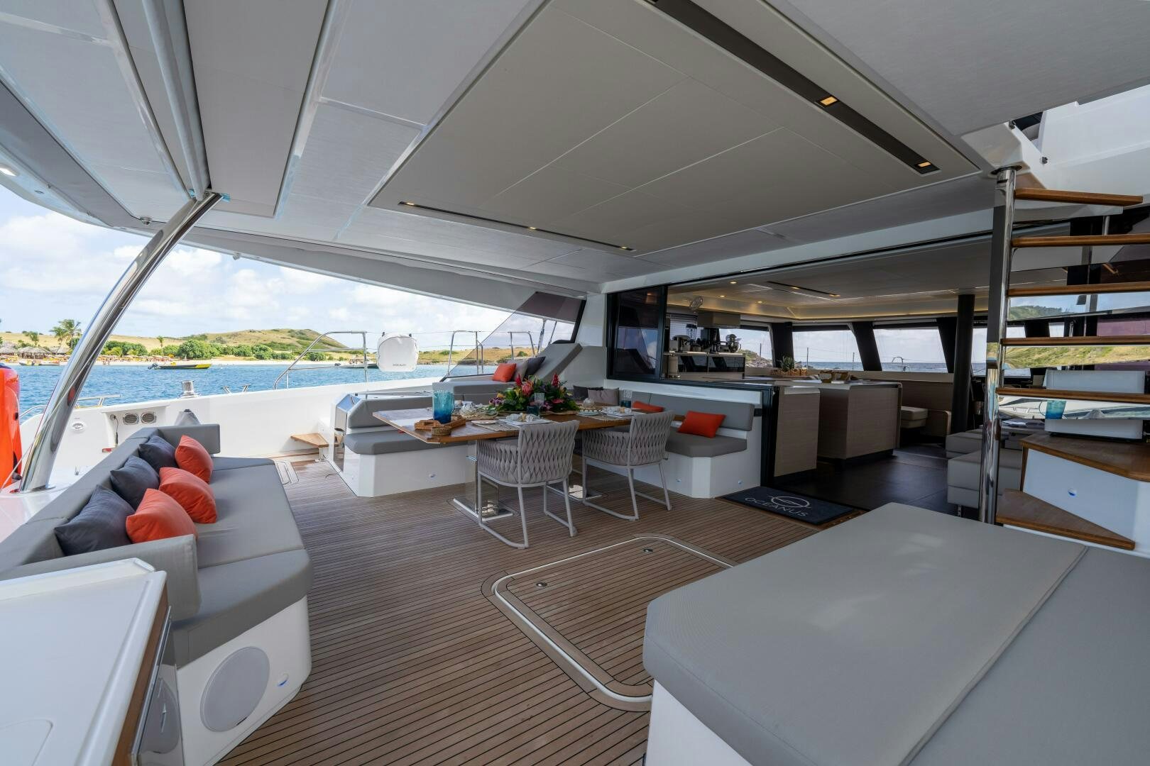 a living room with a large open roof aboard OCEANUS Yacht for Sale