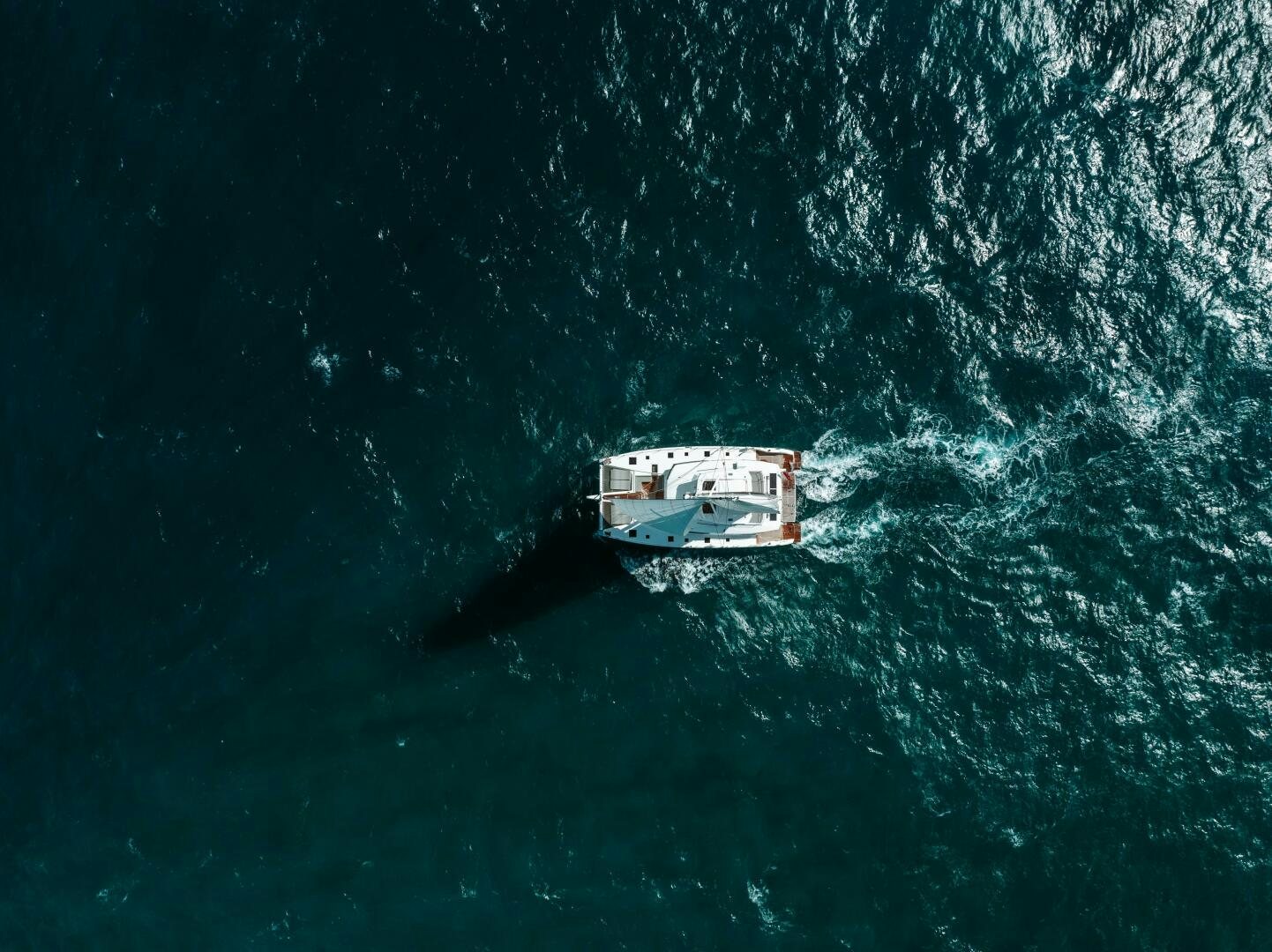 a boat in the water aboard OCEANUS Yacht for Sale