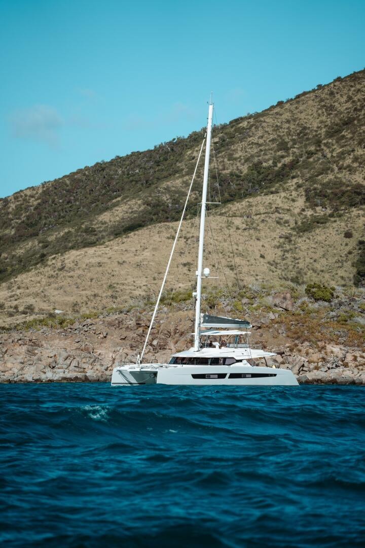 a boat sailing on the water aboard OCEANUS Yacht for Sale