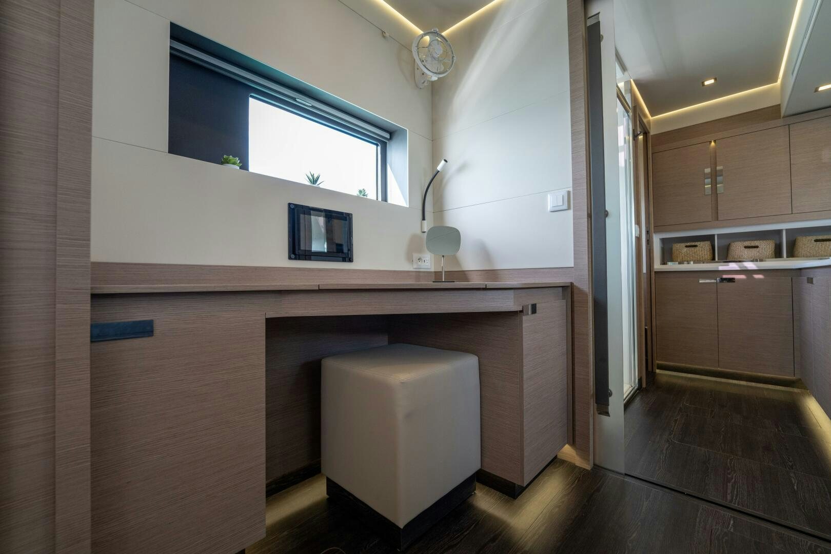 a bathroom with a sink and cabinets aboard OCEANUS Yacht for Sale