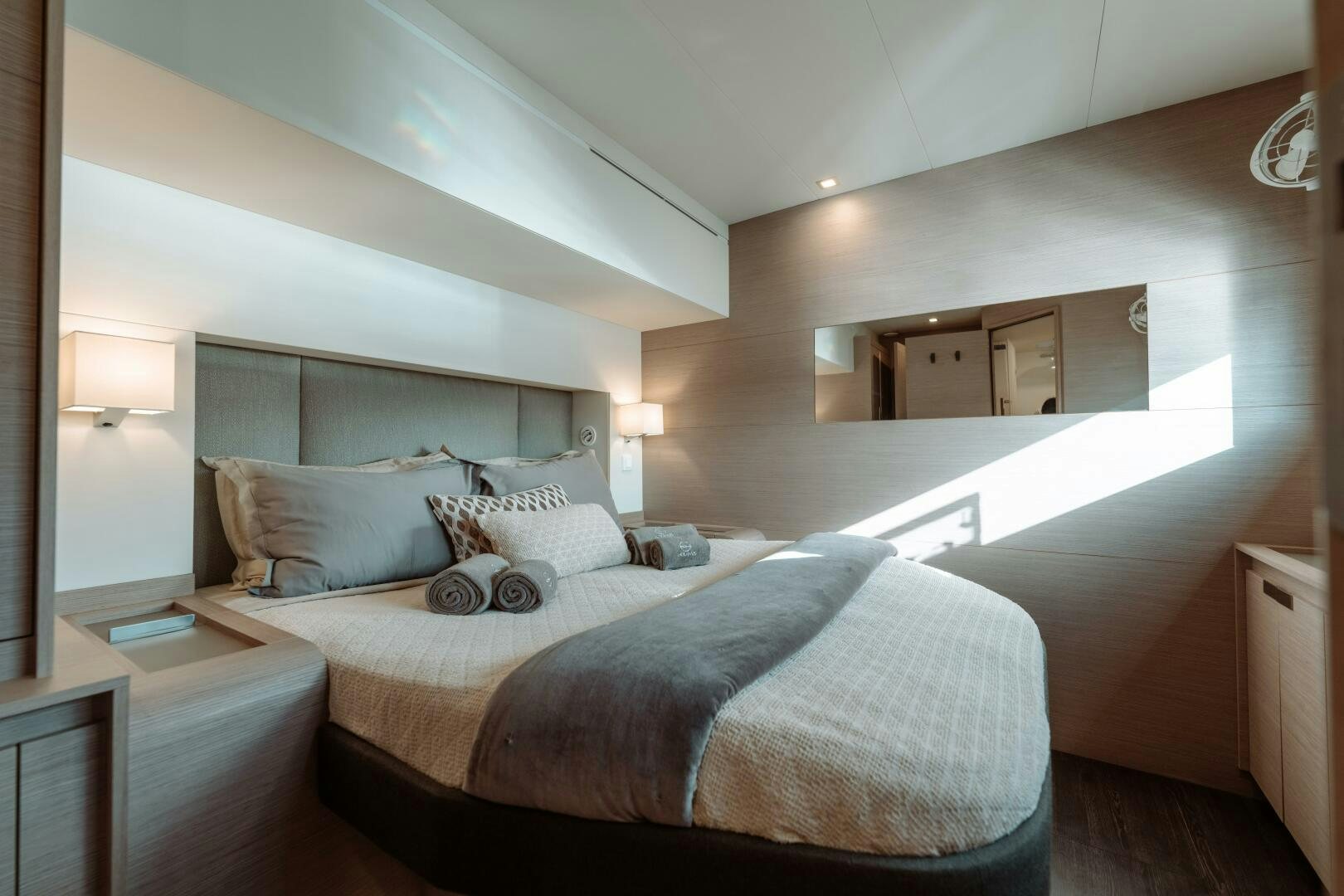 a bed in a room aboard OCEANUS Yacht for Sale