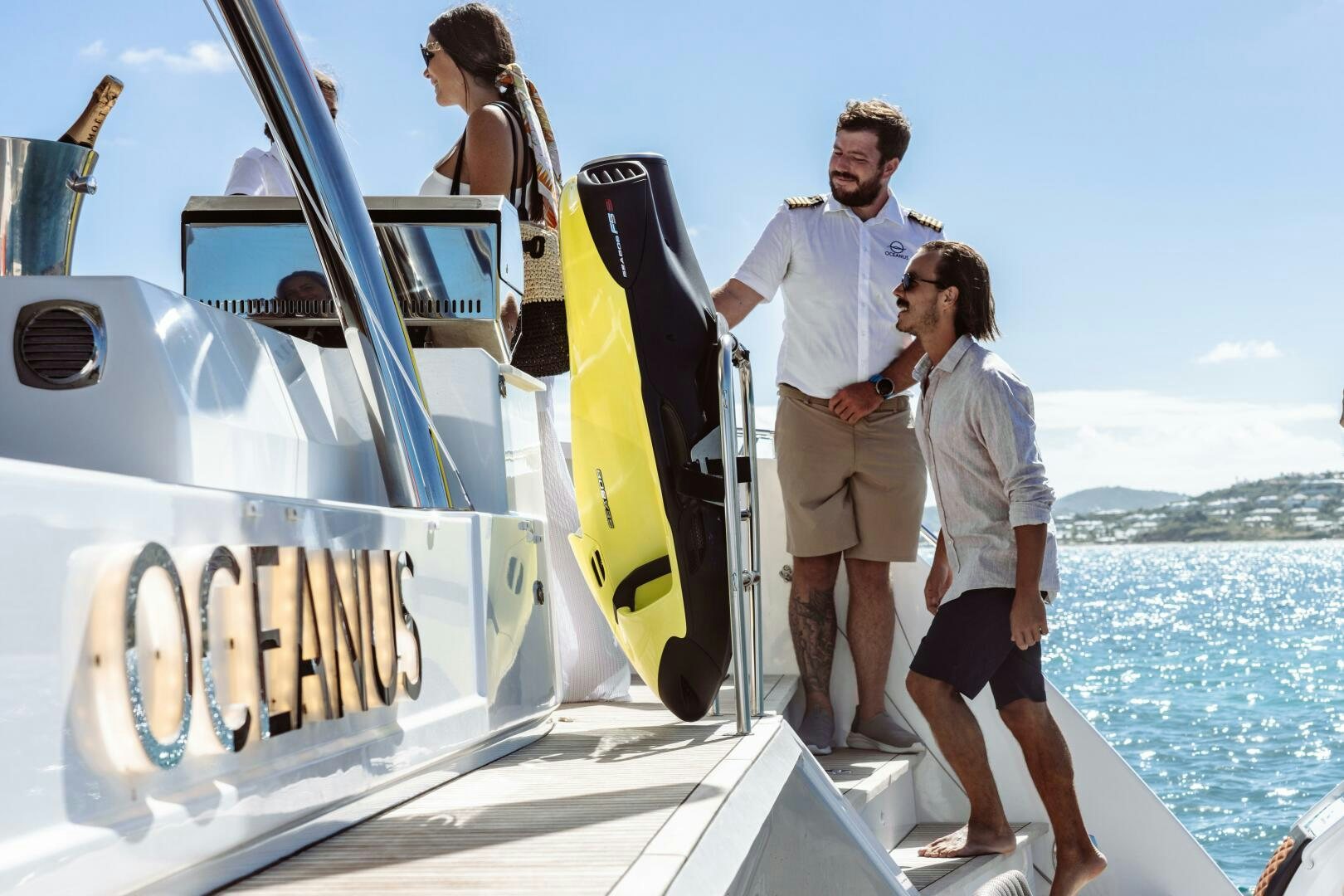 a group of people on a boat aboard OCEANUS Yacht for Sale