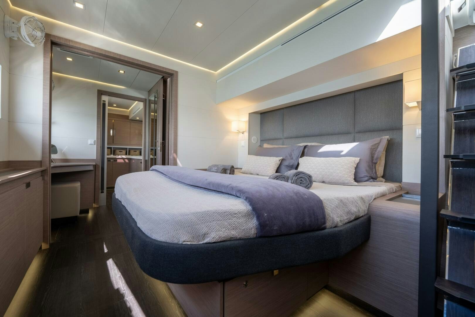 a bed in a room aboard OCEANUS Yacht for Sale