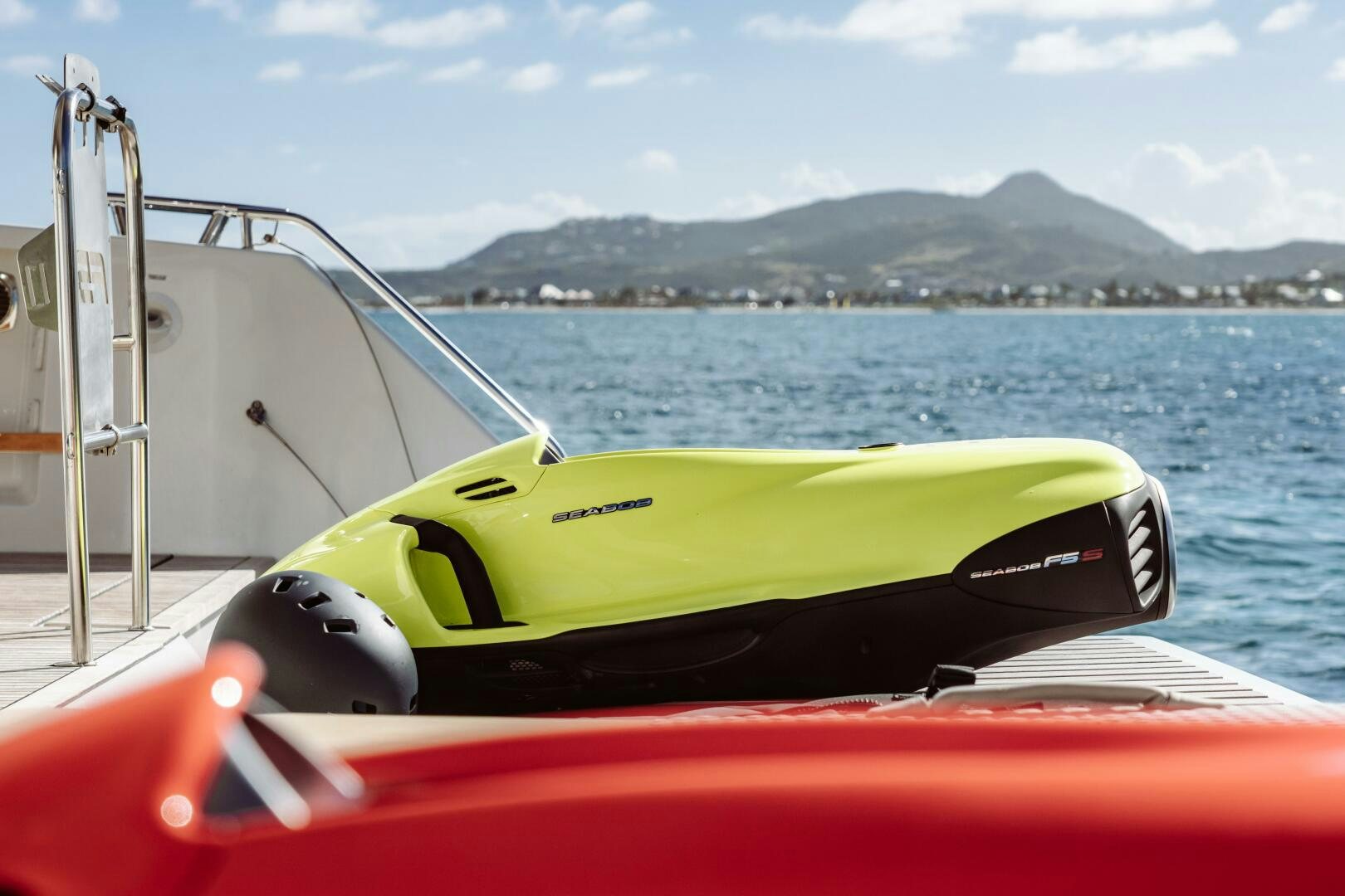 a green and black boat on a body of water aboard OCEANUS Yacht for Sale