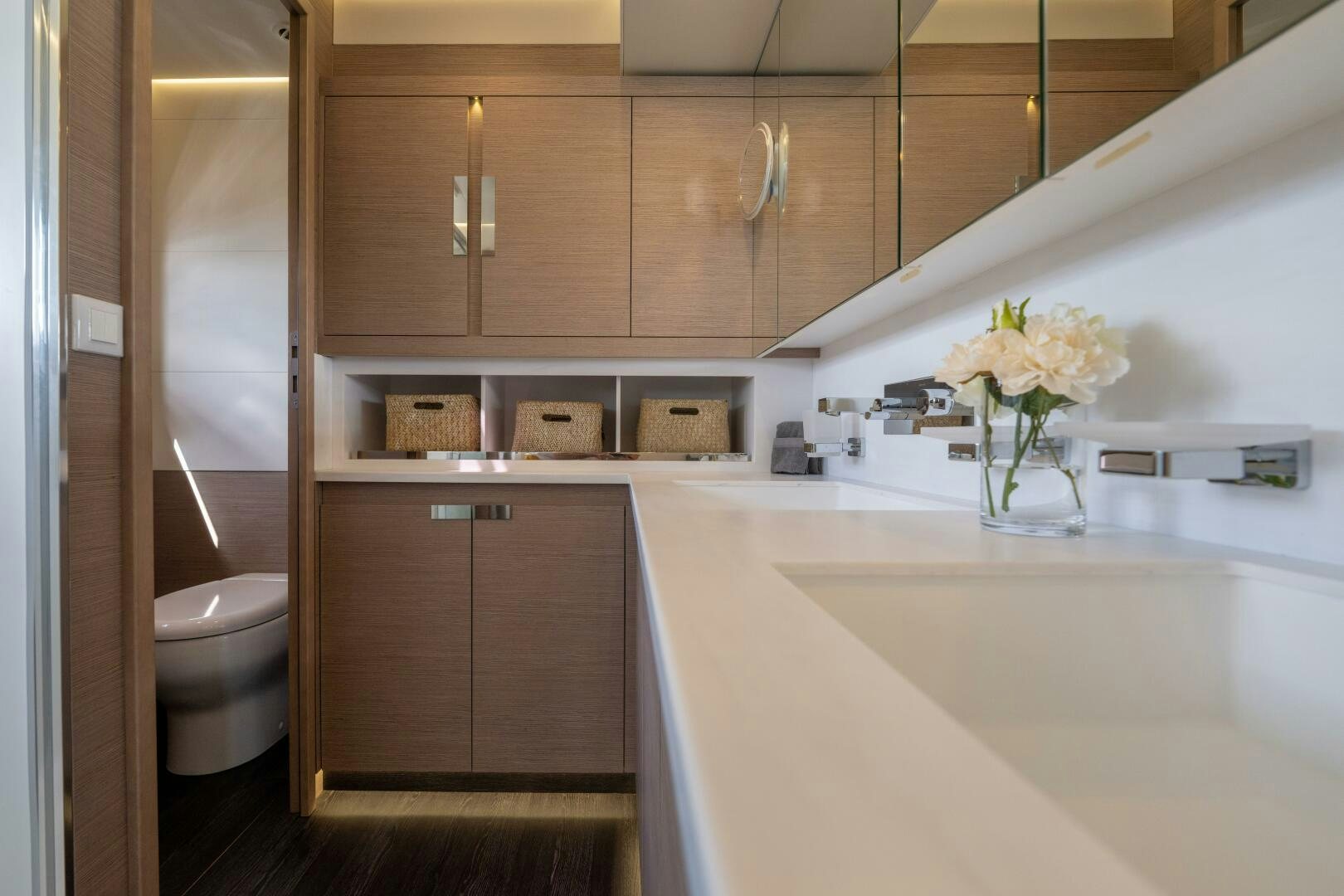 a kitchen with a sink and cabinets aboard OCEANUS Yacht for Sale