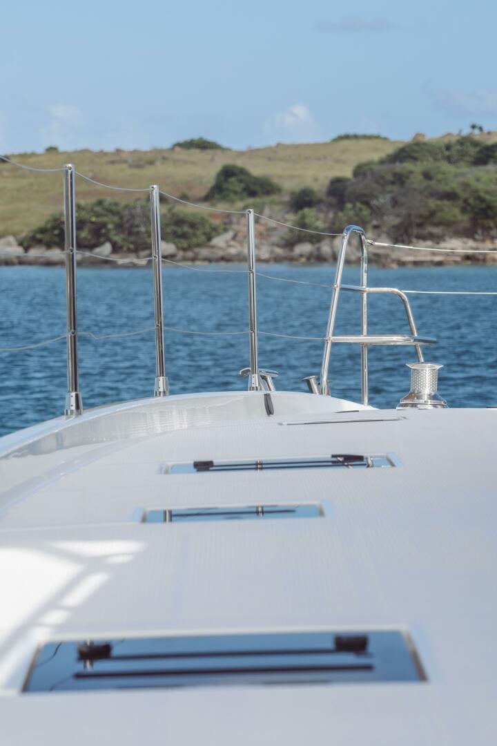 a white boat on the water aboard OCEANUS Yacht for Sale