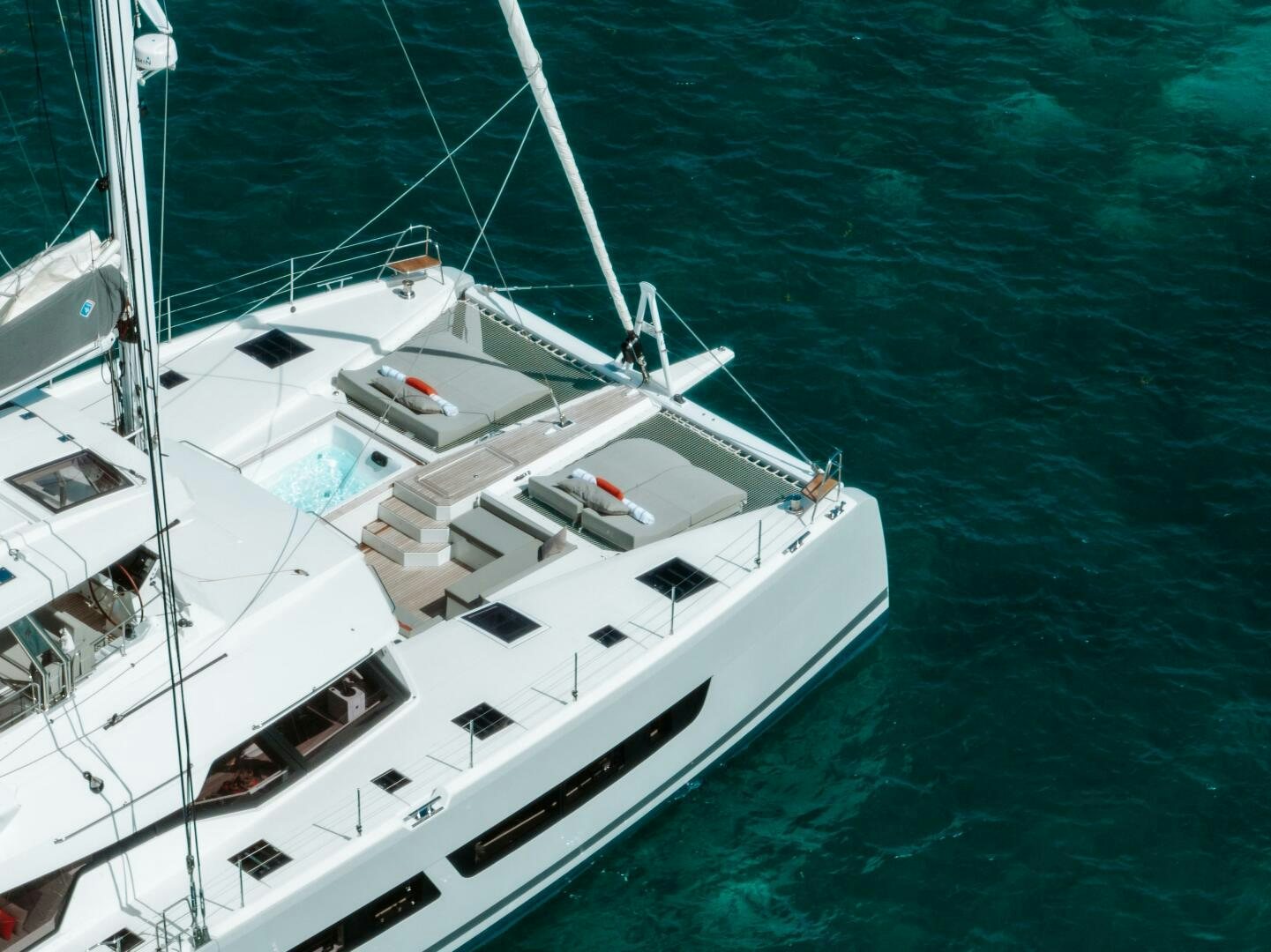 a white boat in the water aboard OCEANUS Yacht for Sale